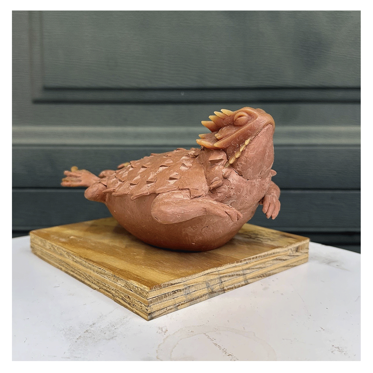 joshua-tobey-bronze-sculpture-horned-toad-puffed-precast-side-view.png