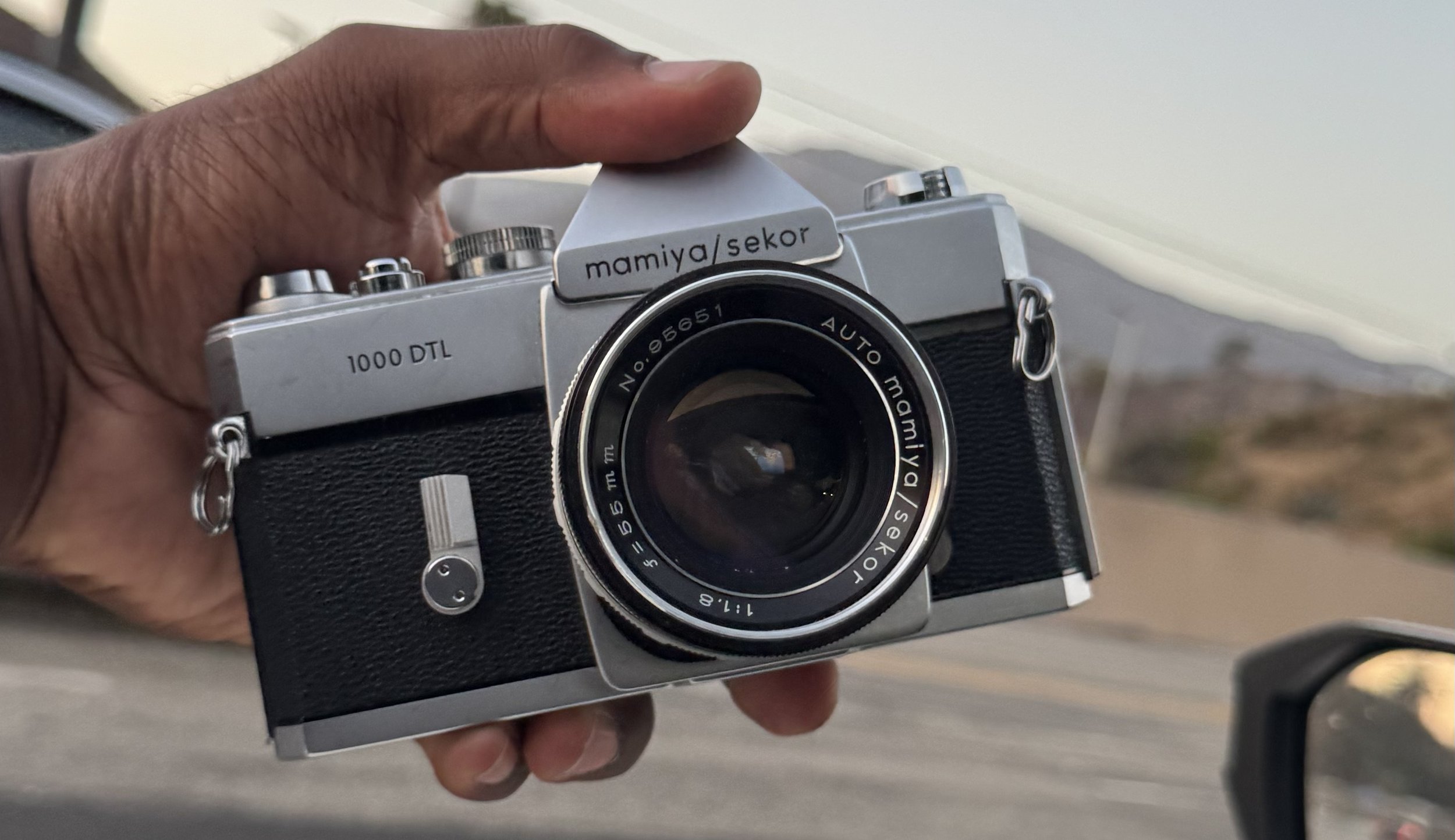 Silver and Black Mamiya/sekor 1000dtl