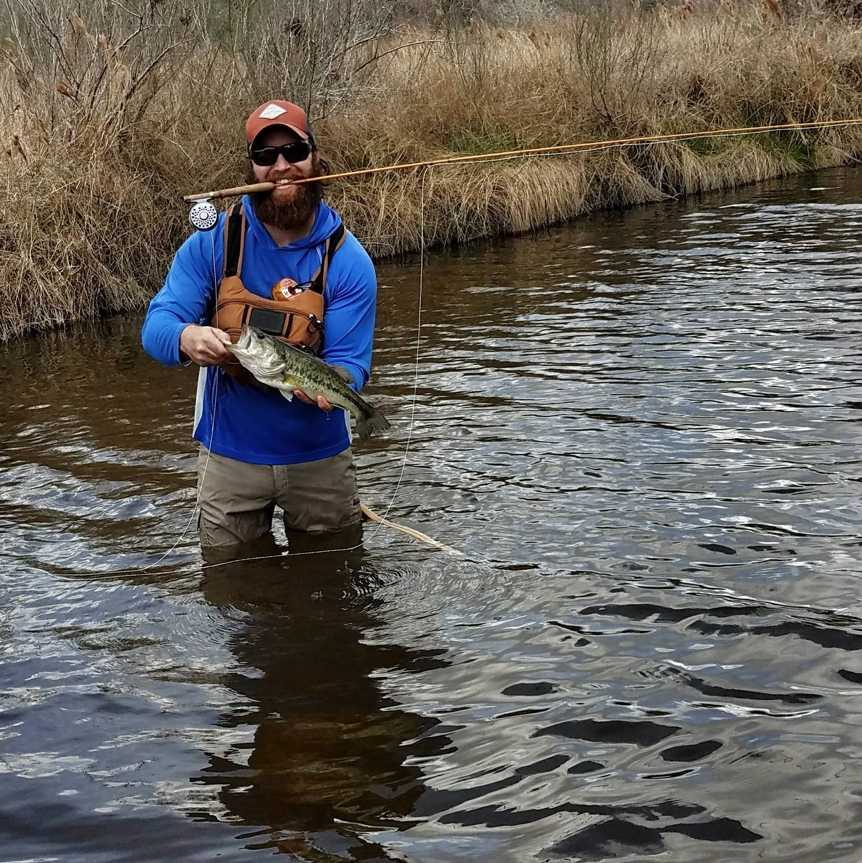 Jess with a fine creek bass on the C. Barclay 68L.