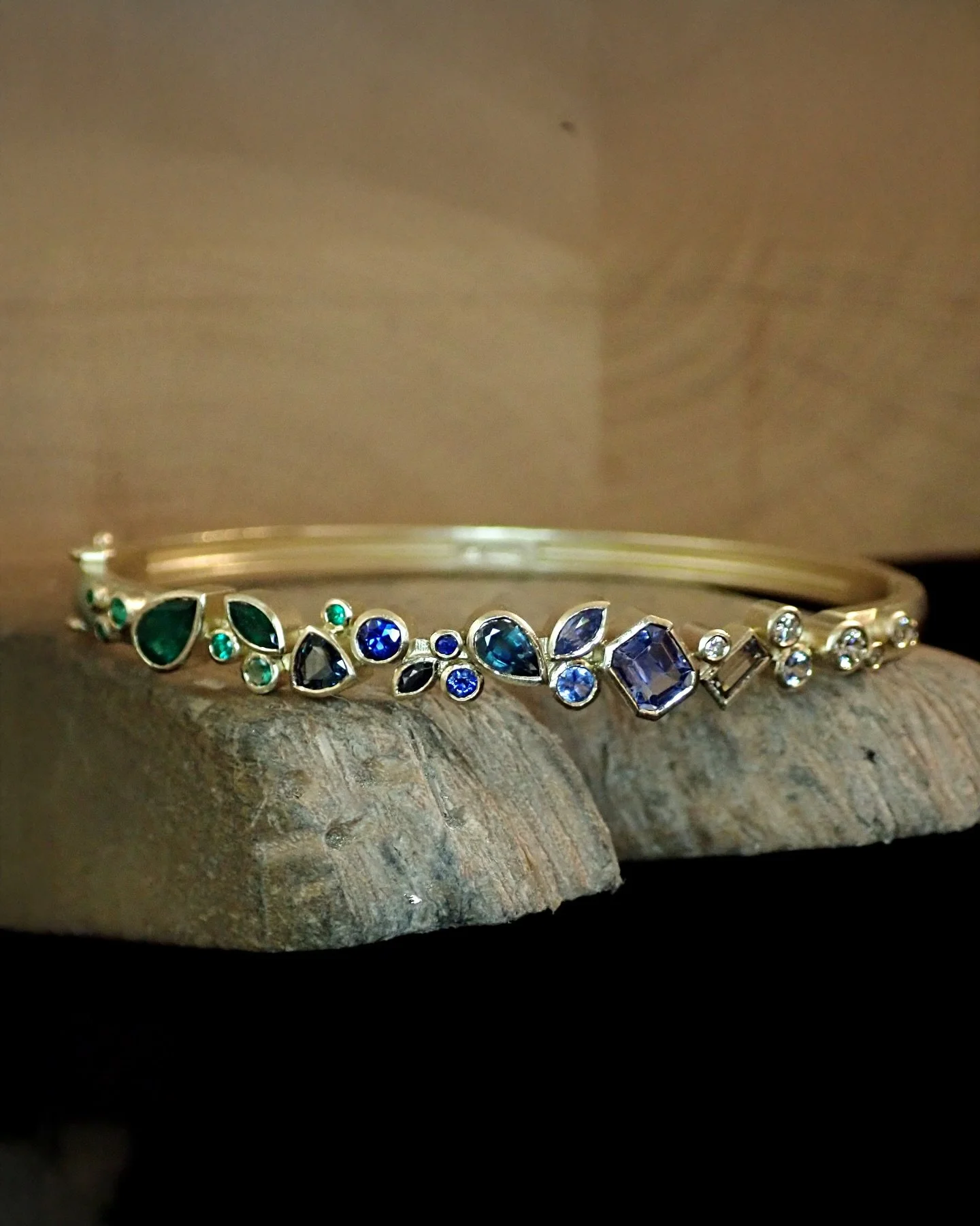 A scatter of sapphires and diamonds like little treasures around your wrist.

I sourced this mix of different shapes and tones. Nothing too matched. More like little finds gathered over time.

Set together, they just work. Soft shifts in colour, each