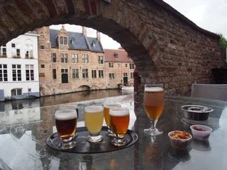 Belgium beers with Canal Backdrop.JPEG