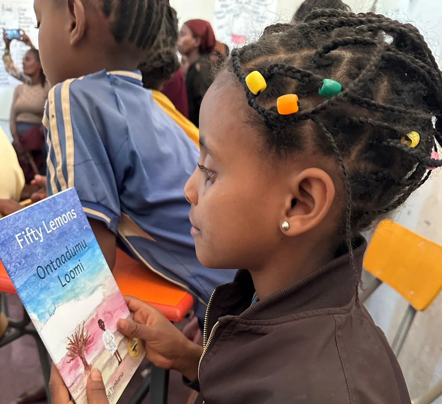 Bezawit and her classmates LOVE their new mother-tongue books!