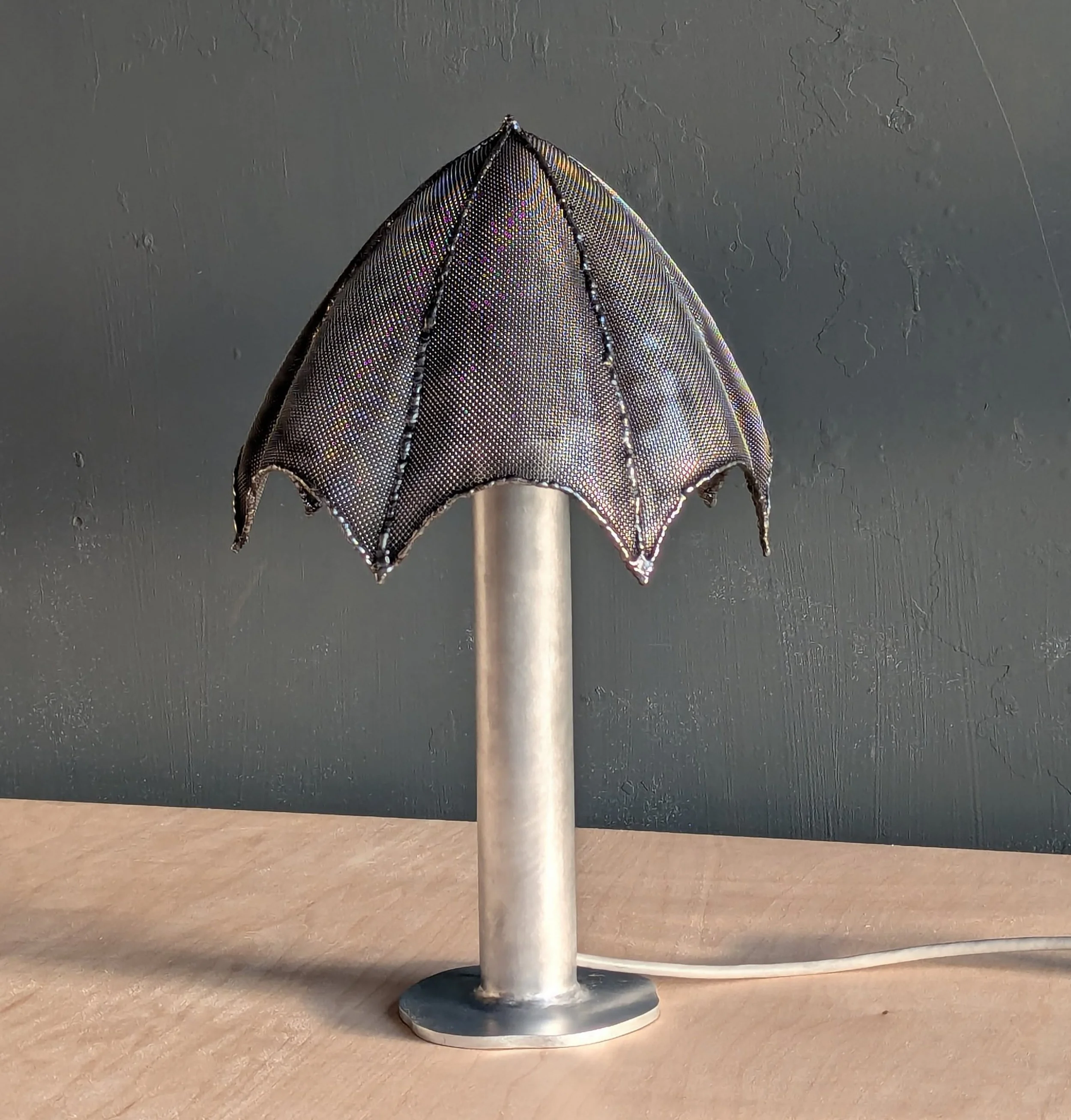   CARL DURKOW    Moire Lamp   Stainless steel mesh, aluminum  16 x 10 x 10 inches   $1,400  