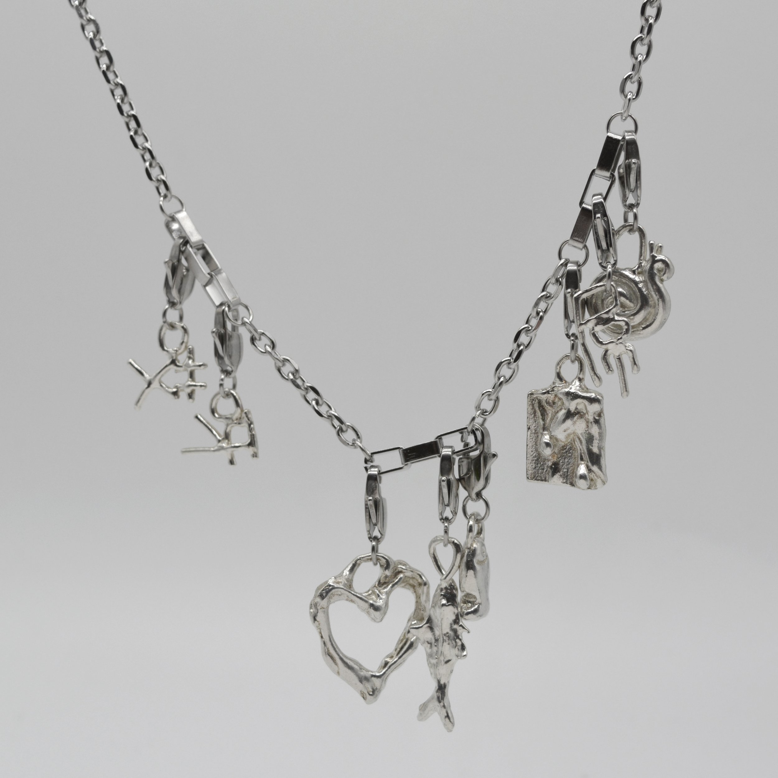 SILVER CHARM NECKLACE SQUARE 2.jpg