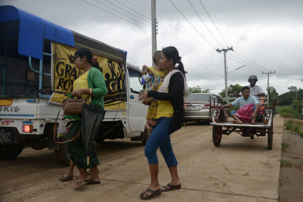 Patients risk travel on precarious vehicles, such as this one, with entire families crammed into tight spaces.