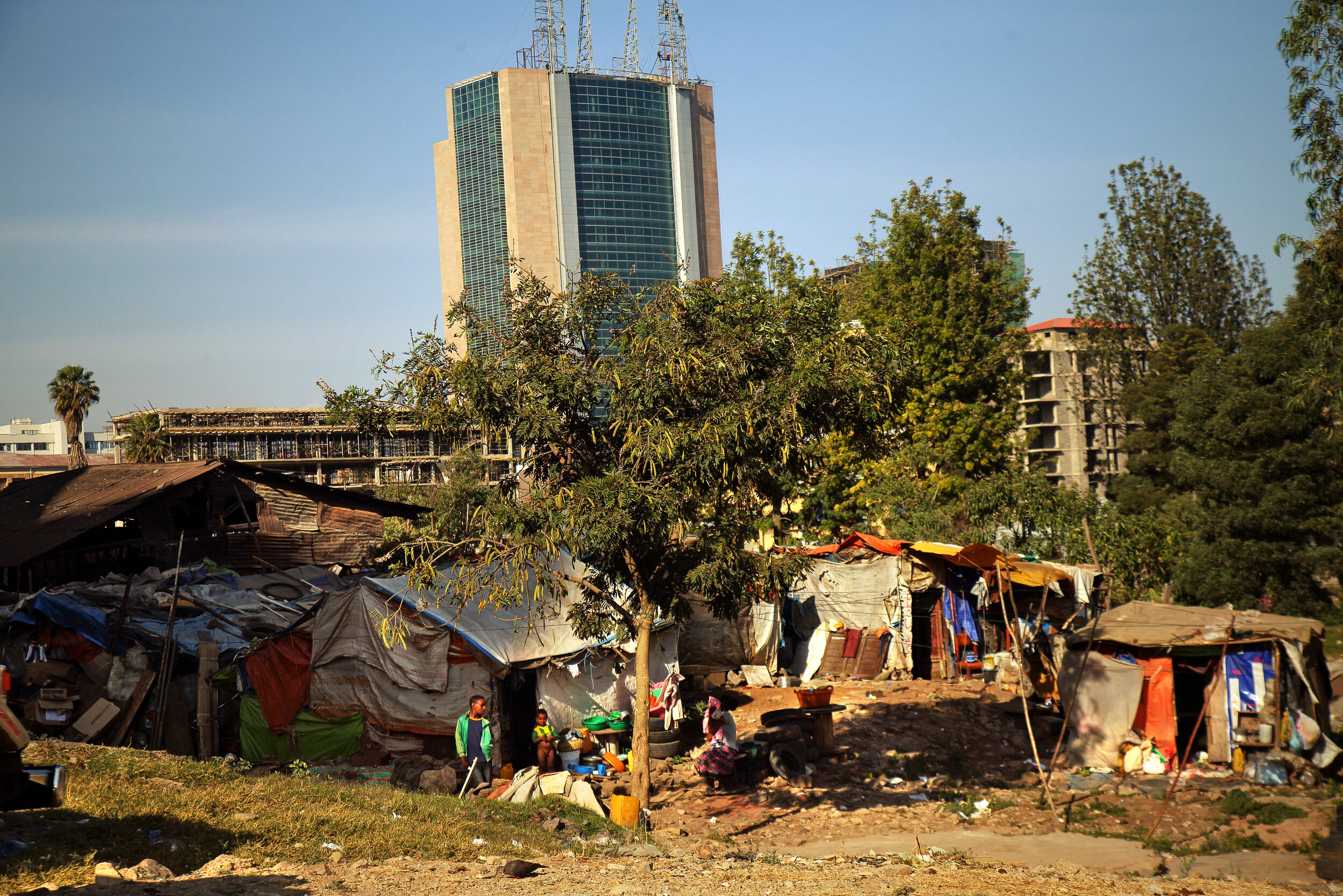 Informal settlers squat in make-shift shelters. 