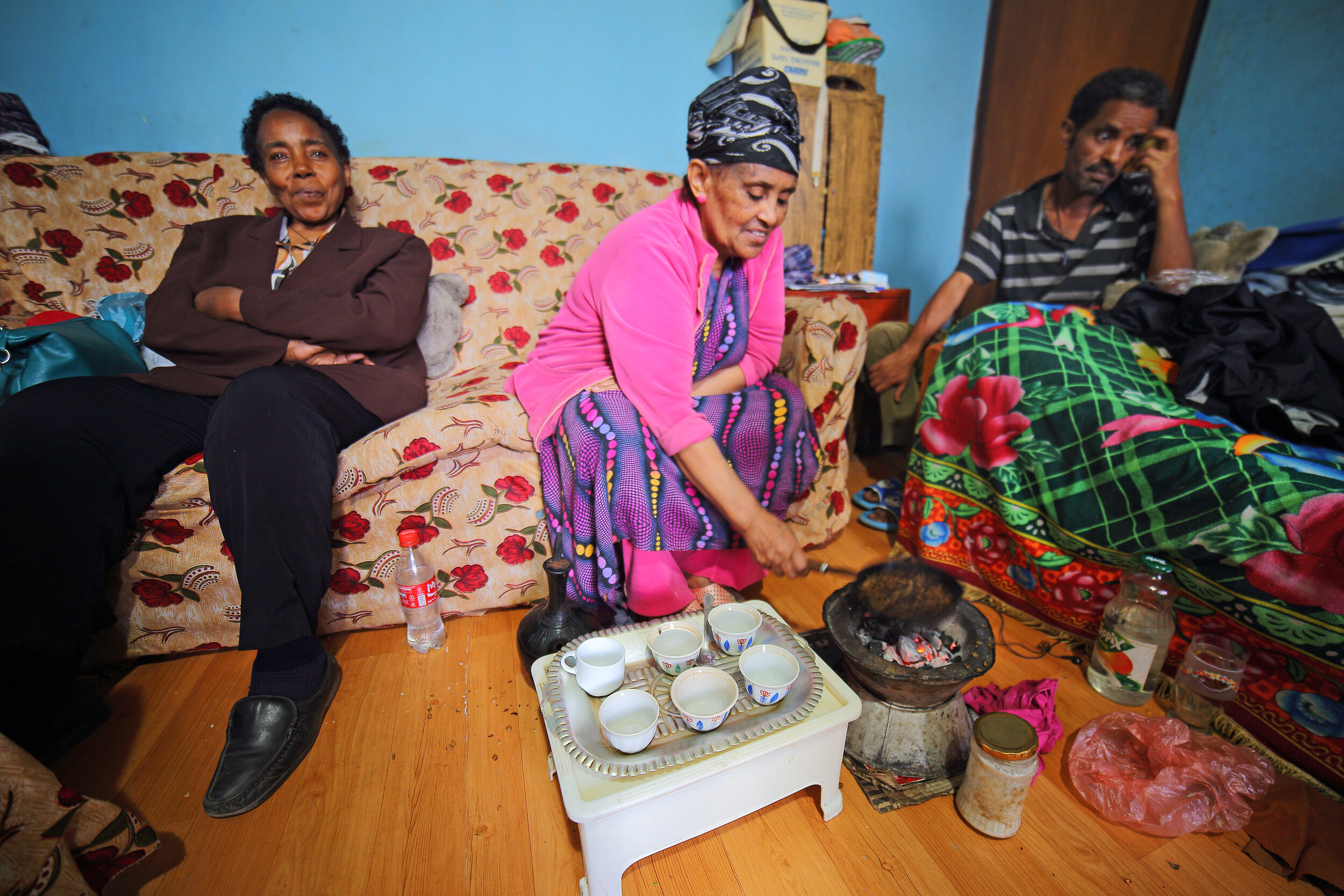  This family received a condominium because they were relocated from a redevelopment area in the center of Addis. This picture shows the importance of social interaction in Ethiopia, especially the “coffee ceremony,” to connect with other people, be 