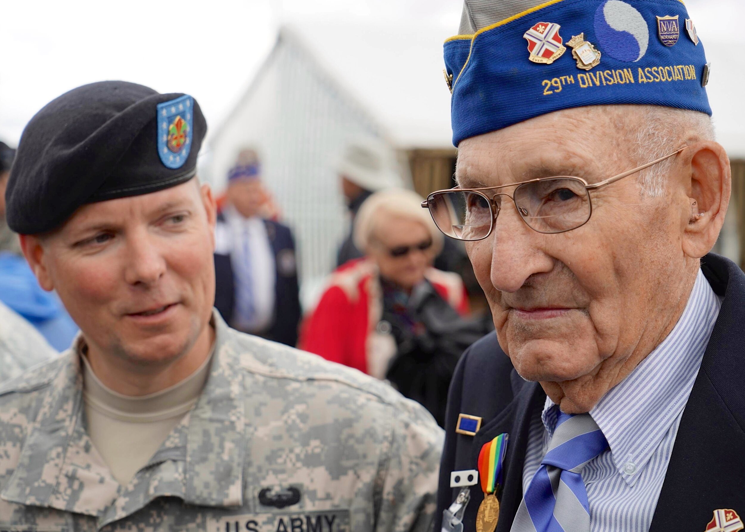  D-Day veteran Arden Earll with current “29er” at the ceremony. Arden is a Pennsylvania native who landed on Omaha Beach in the first minutes of the D-Day invasion as a member of Company H, 116th Infantry, 29th Division. He holds two Purple Hearts fo