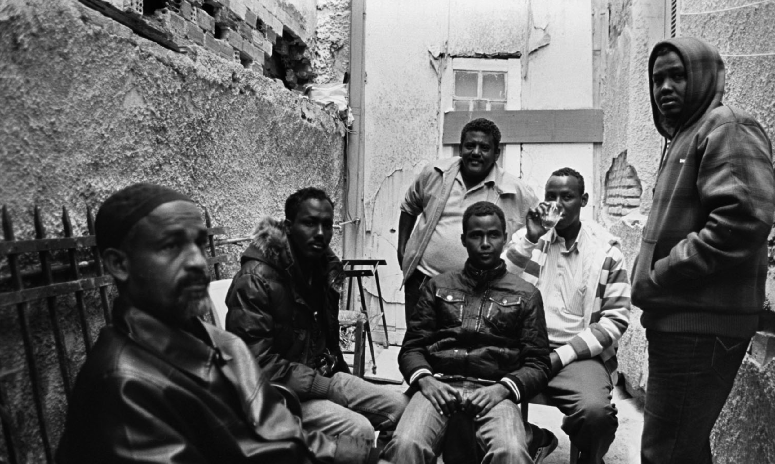  Somali Migrants at the makeshift Somali Community Centre in Central Athens. Somali migrants have occupied a derelict building and transformed it into a functioning resource for Somalis, which includes a restaurant, an office area, a praying room, a 