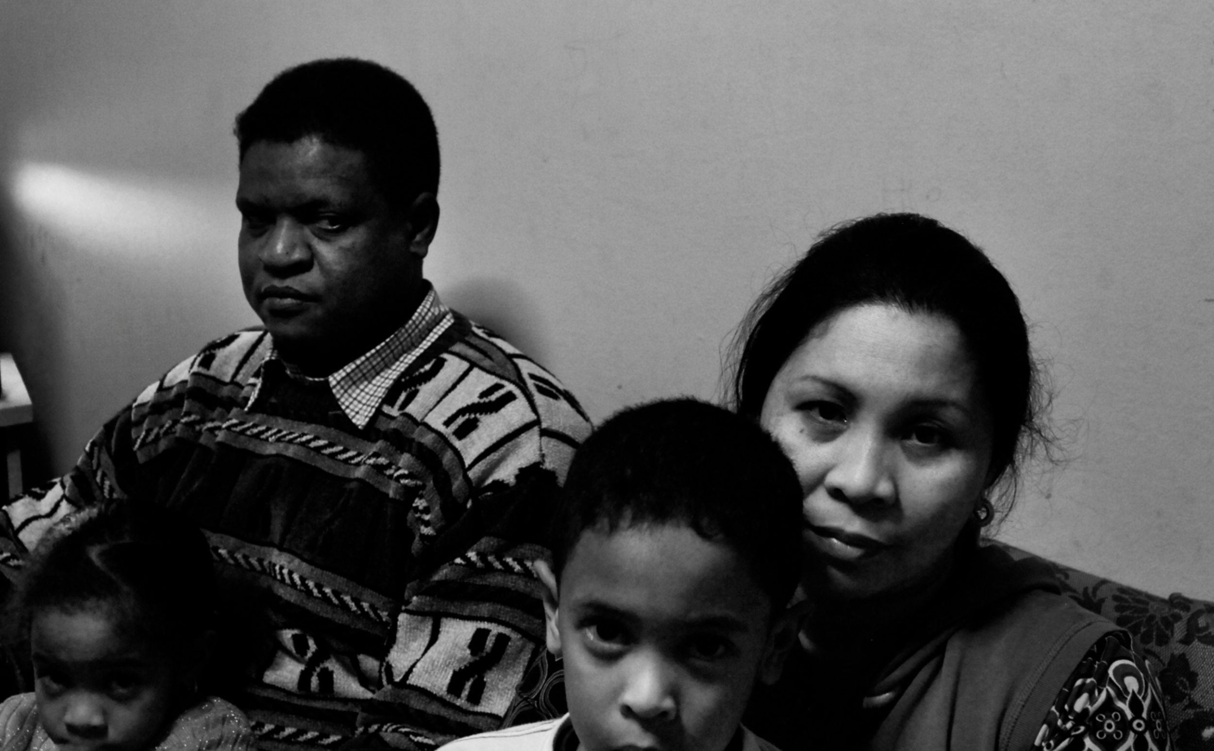  Muhamud, a Sudanese national, his wife Lisel, and their two children in their apartment in Athens, Greece. 