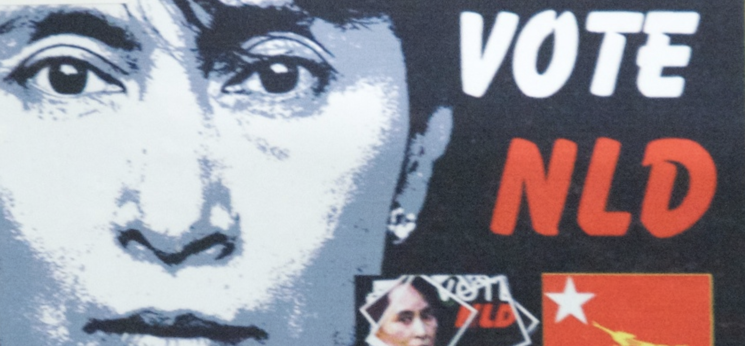  An NLD campaign poster in Yangon, the former capital of Burma and its largest city. In a move that remains unexplained today, the nominally civilian government headed by President Thein Sein initiated a series of political reforms after coming to po