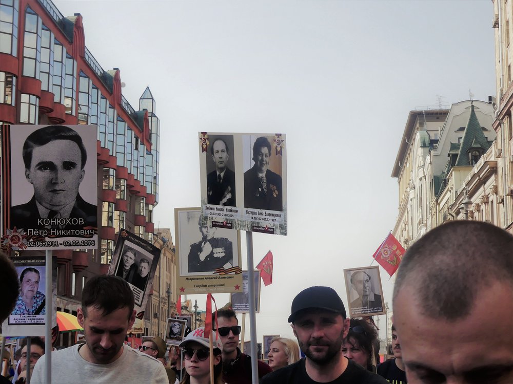  More people join the Immortal Regiment, hoisting photos of their brave ancestors with pride. 