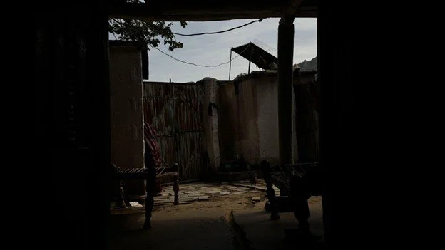   Photo 5:  The courtyard of a traditional mud home in rural Buner, Pakistan. These domestic spaces are the primary sites of resilience for refugee families, providing a modest but essential sense of belonging amid decades of displacement. 