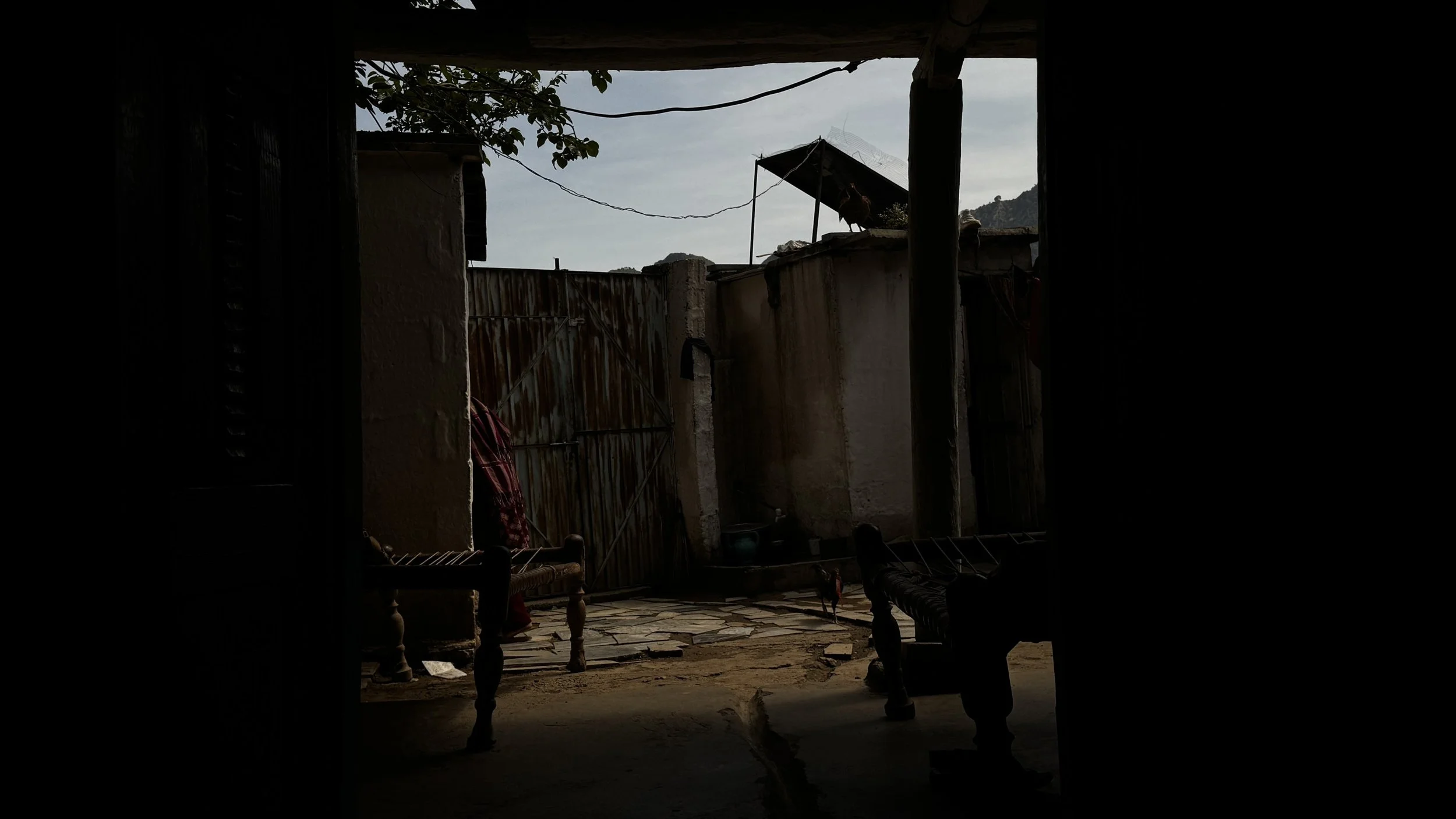   Photo 5:  The courtyard of a traditional mud home in rural Buner, Pakistan. These domestic spaces are the primary sites of resilience for refugee families, providing a modest but essential sense of belonging amid decades of displacement. 