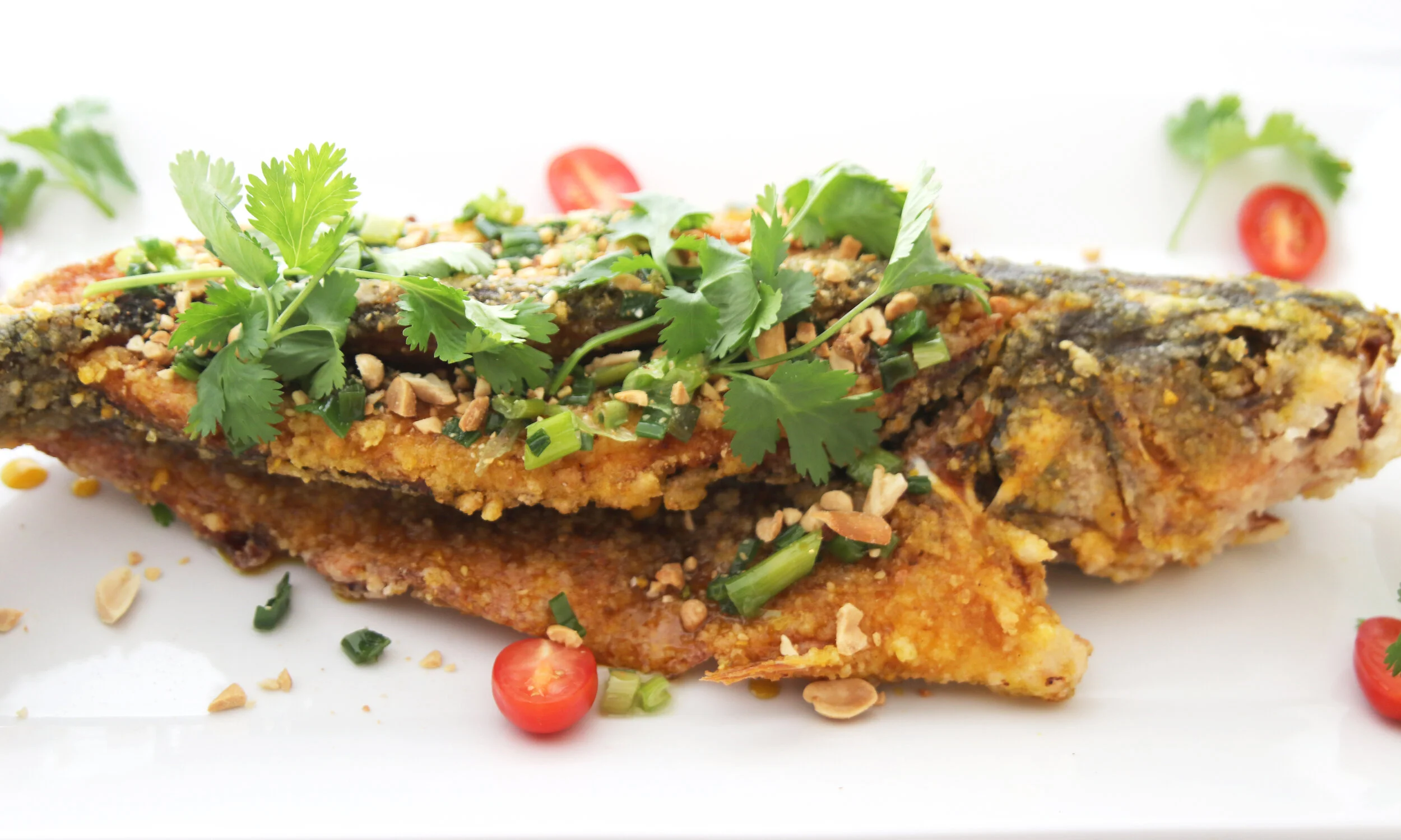 E16. Crispy Red Fish with basil, mint, etc….