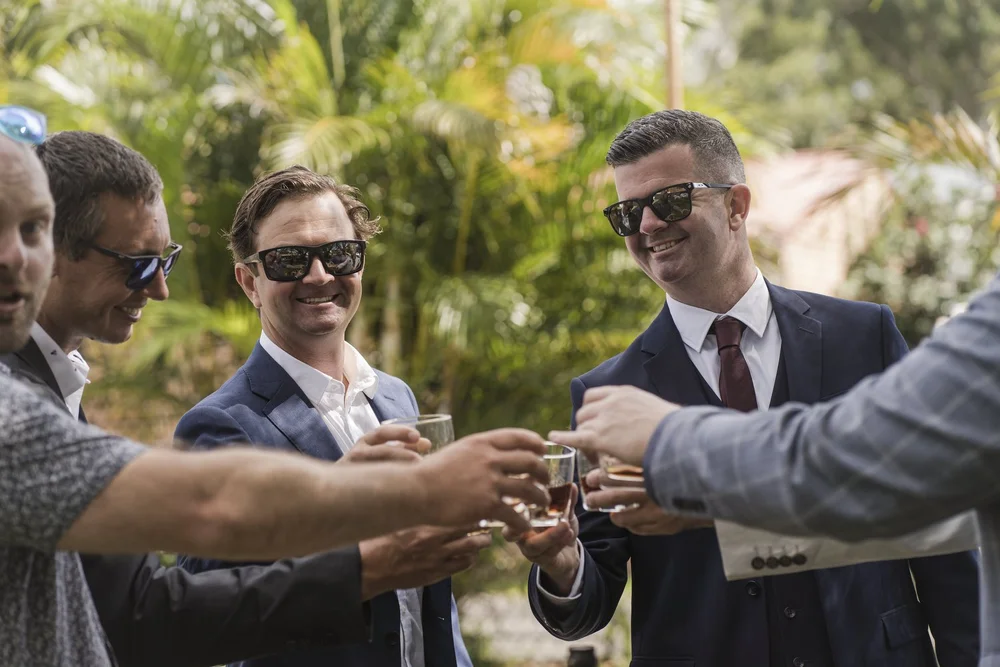 Wedding party celebrating outdoors near Newcastle