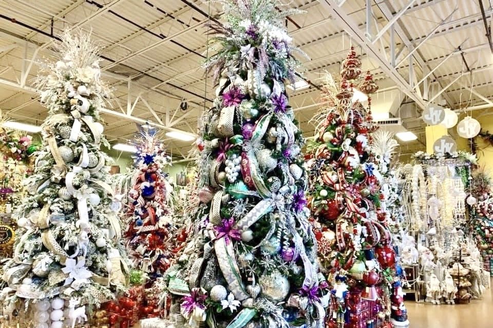 More than fifty decorated Christmas trees at Arcadia's 22,000 square foot Houston showroom