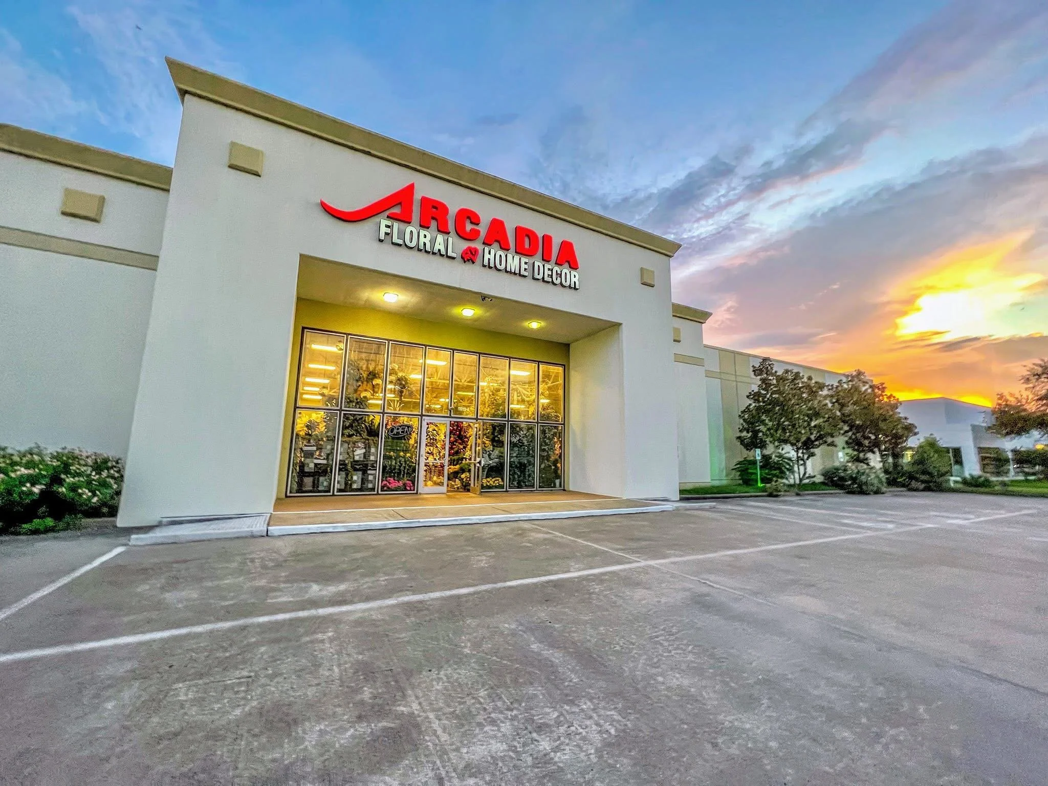 Exterior of the Arcadia Floral & Home Decor showroom at sunset on S. Sam Houston Parkway West in Houston