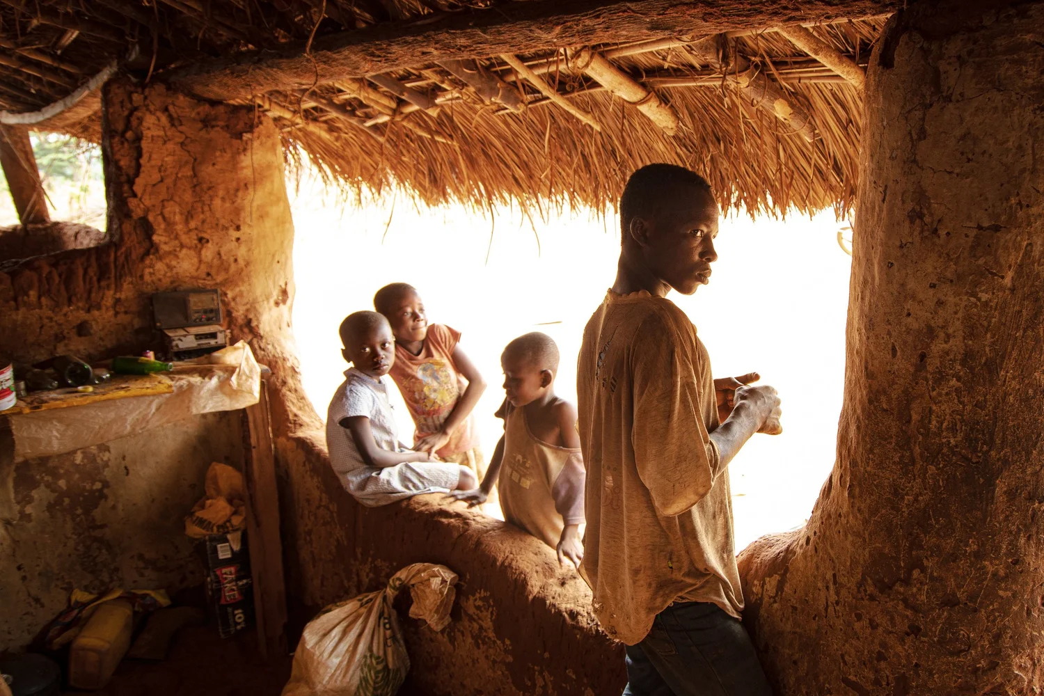 Illuminating Ghana — people gathered in a sunlit room