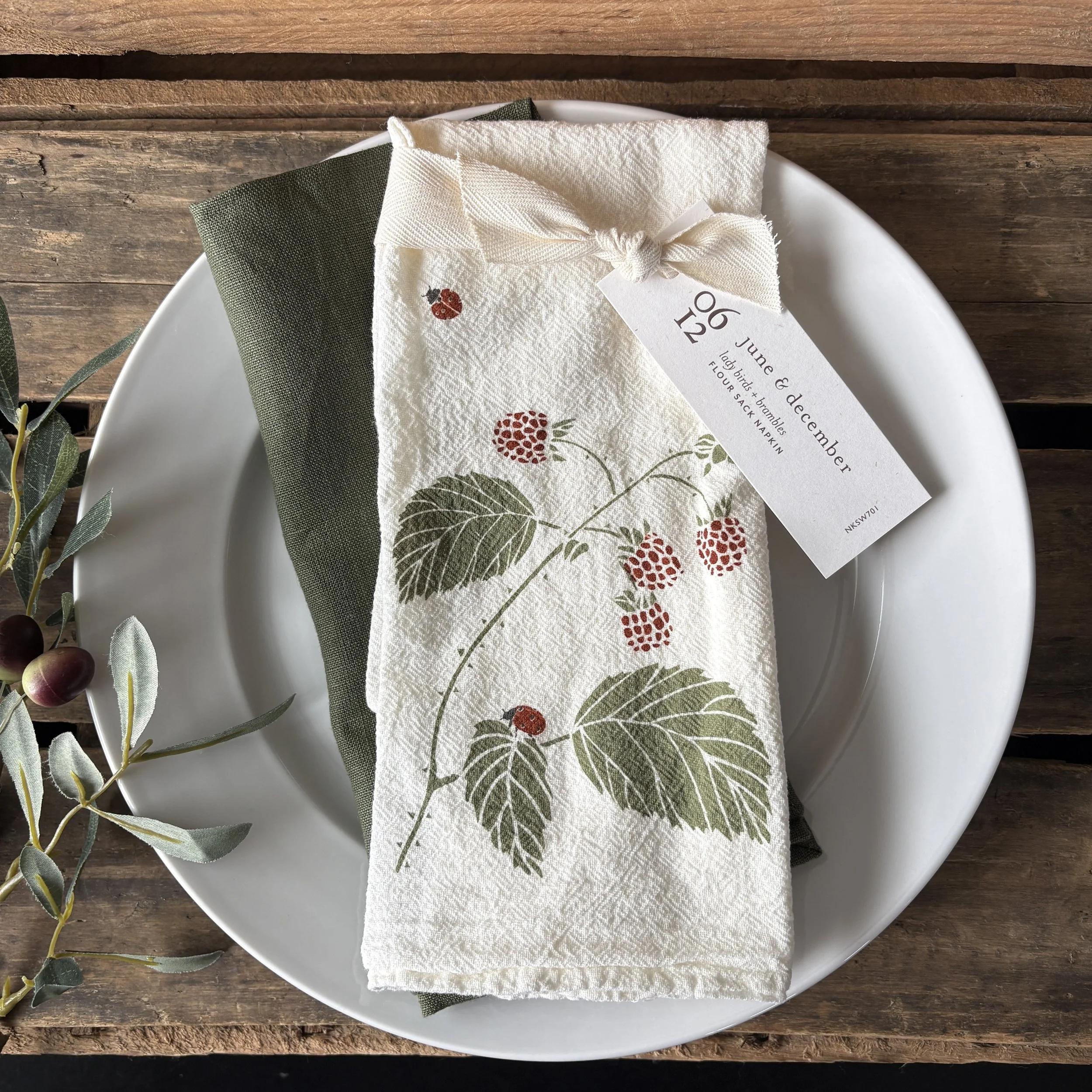 Lady Birds Brambles Cotton Napkin with Olive Linen Napkin.JPG