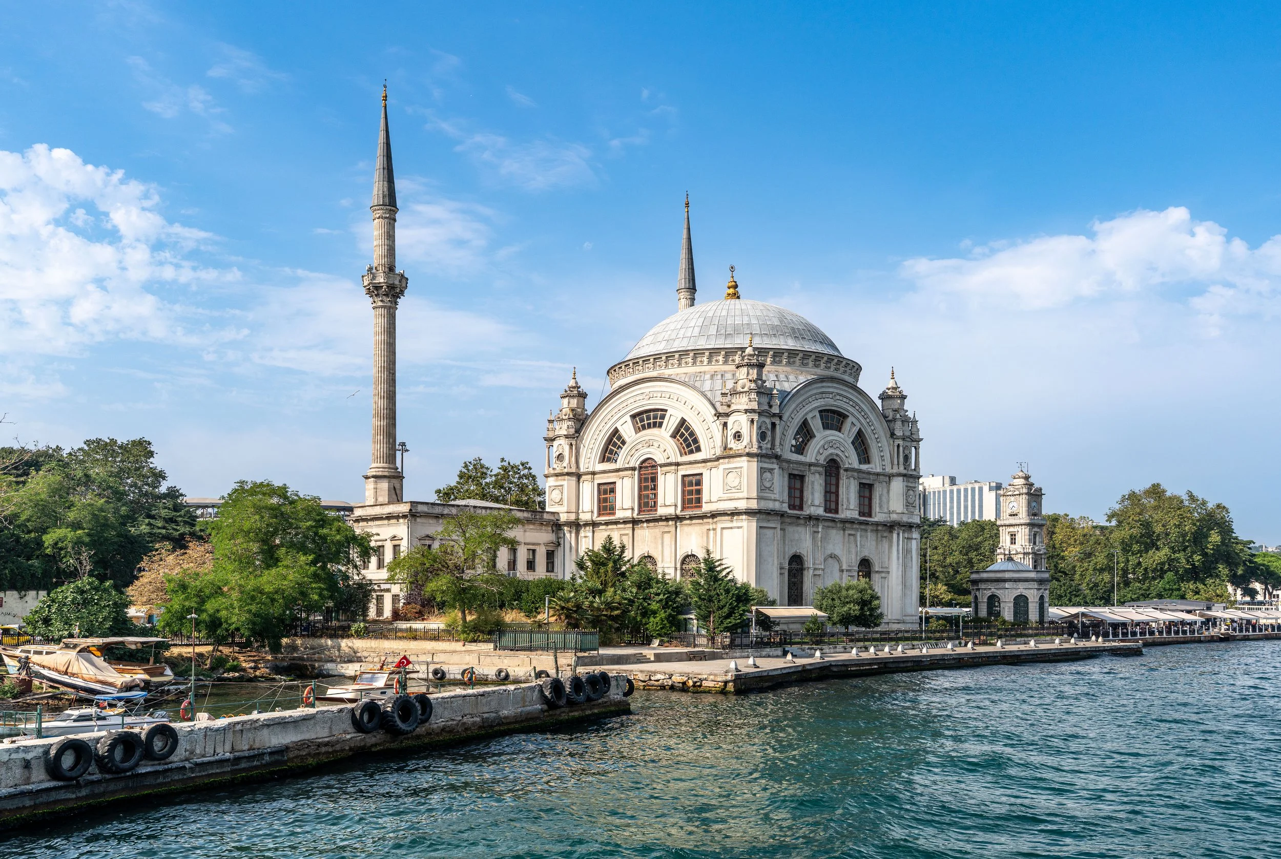 Istanbul, Dolmabahçe Mosque — Domes and minarets reflect on Bosphorus waters, Ottoman grandeur embracing eternity’s flowing horizon.