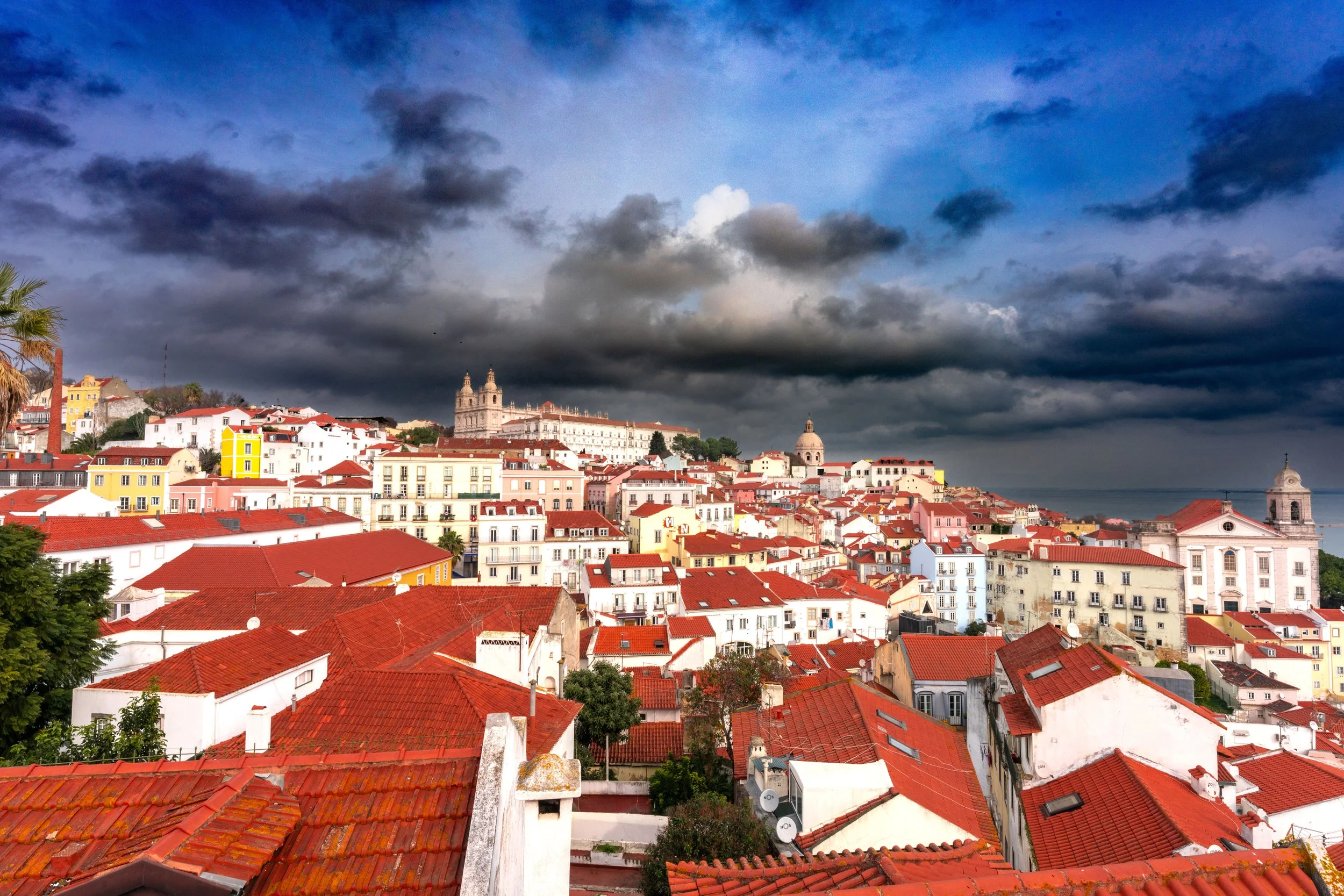 Lisbon, Alfama - Ancient labyrinth of streets, where Moorish whispers and maritime dreams still linger alive.