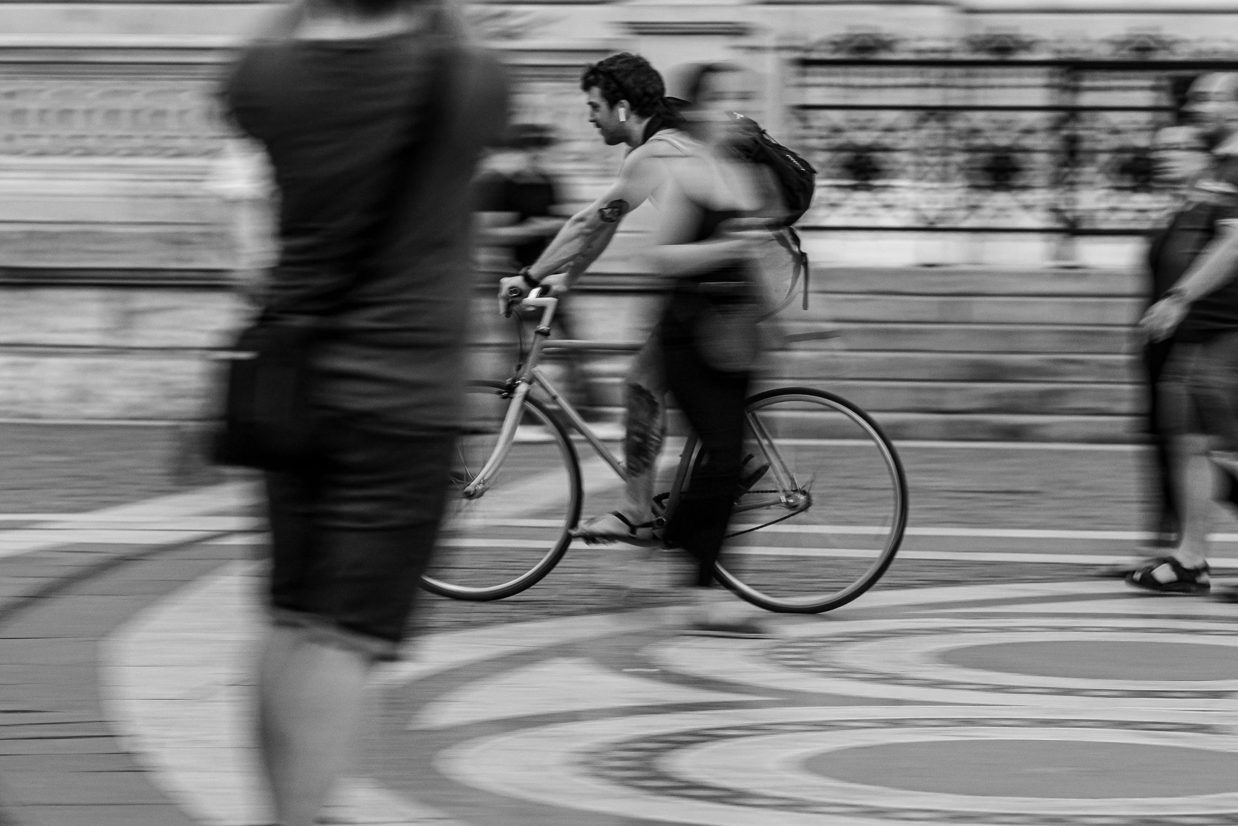 Budapest - Pedals turn, body leans, motion cuts through crowds—time bends into a fleeting blur.