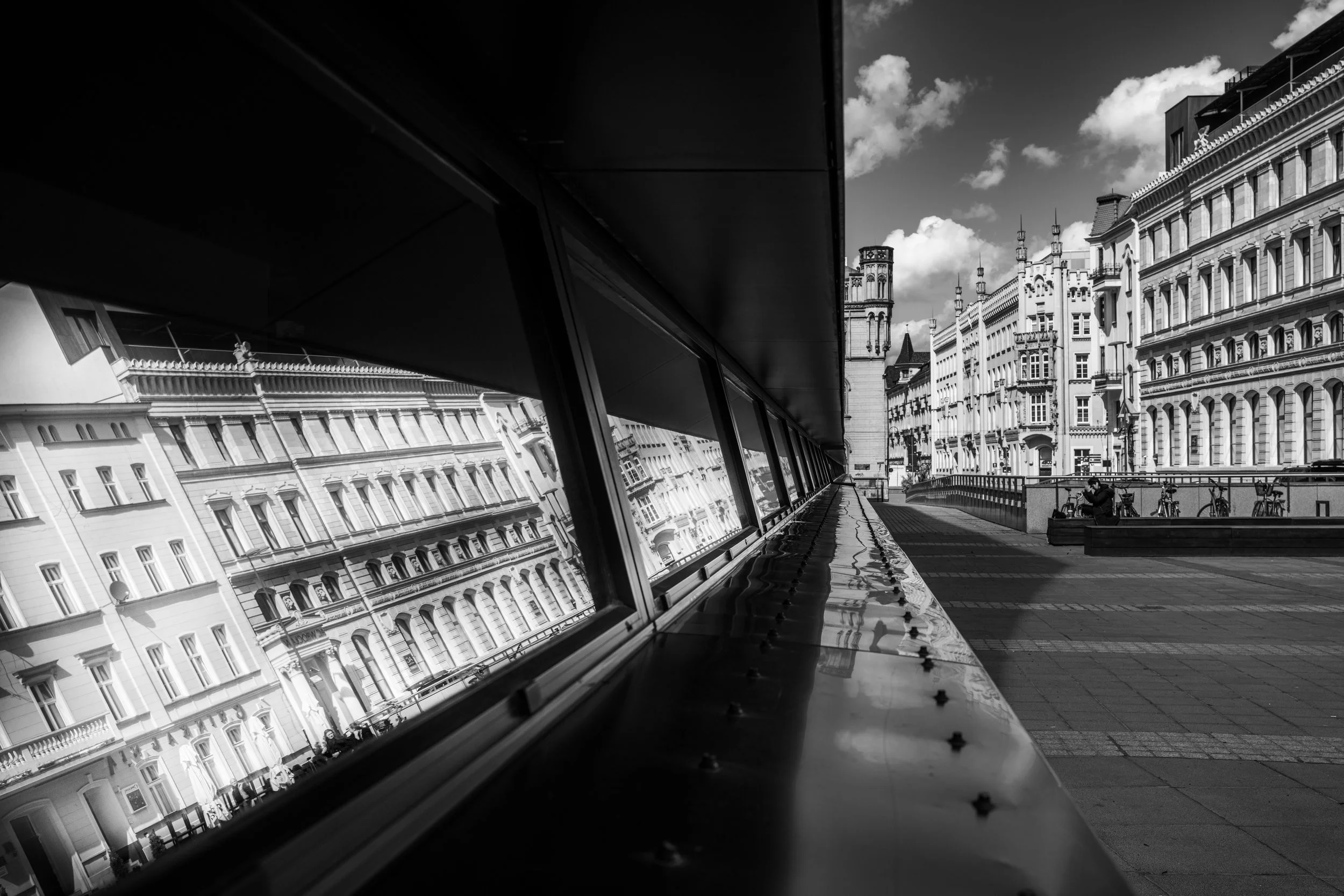 Wrocław: Reflections bend the city, turning facades into a dance of light and time.
