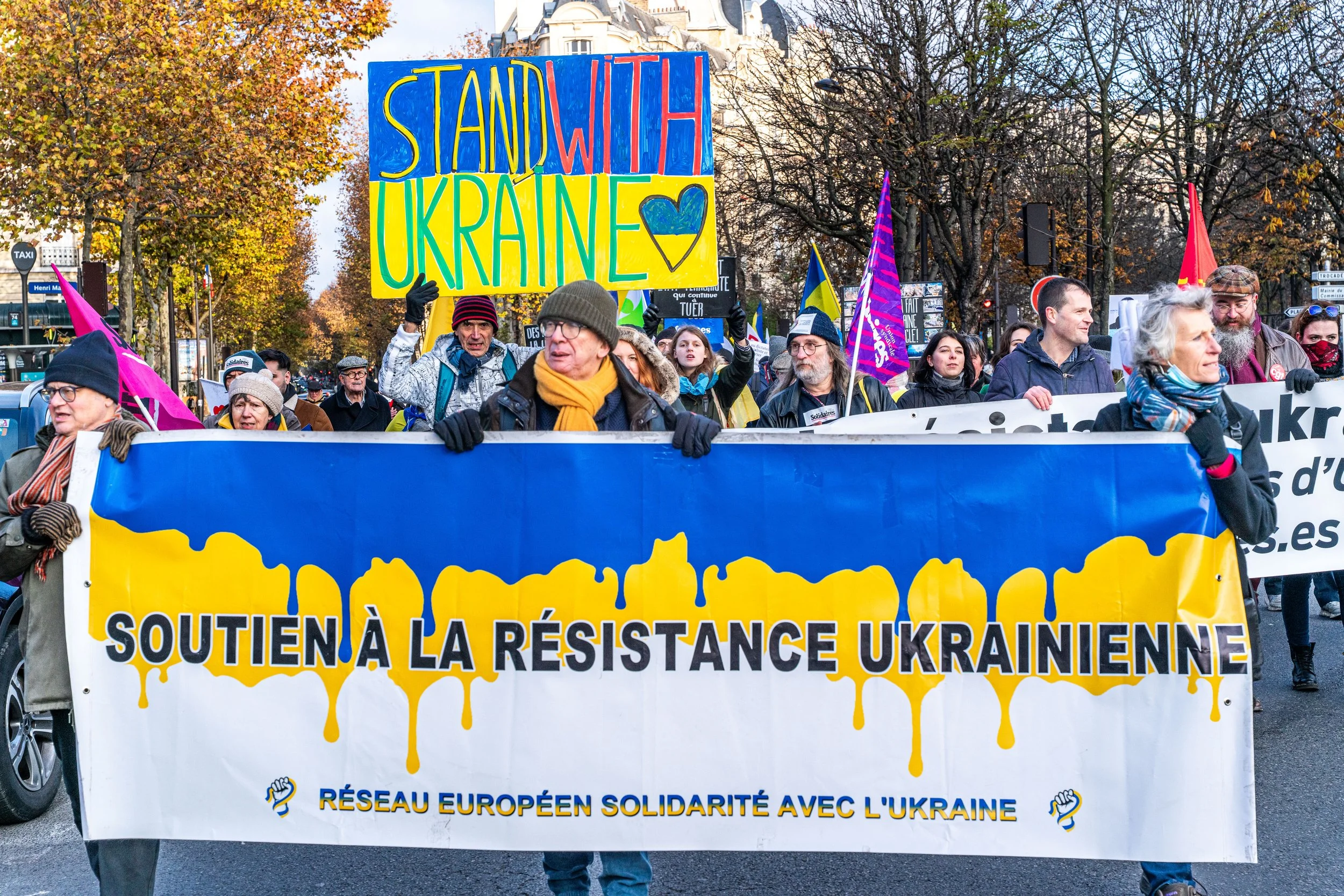 In the streets of Paris, voices unite to stand with Ukraine — a call for freedom and dignity against Russian aggression.