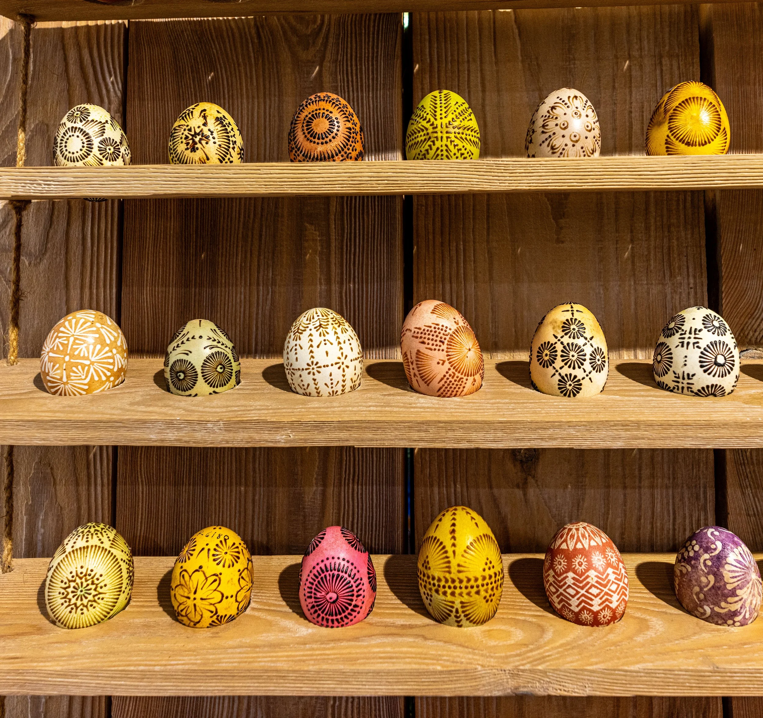 Lithuania – Eggs of tradition, each line a symbol, each color a whisper of spring reborn.