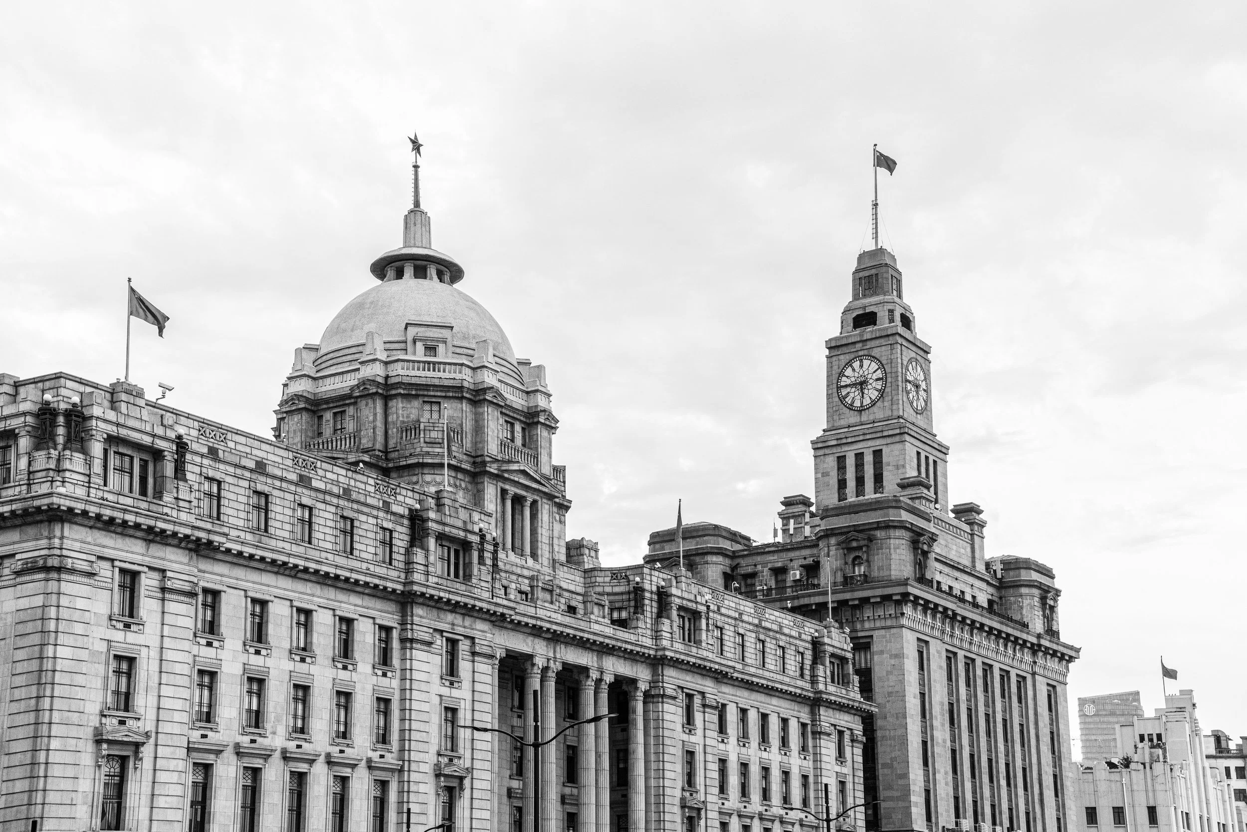 Shanghai, The Bund — Neoclassical giants watch the river, colonial echoes meeting China’s pulse, time engraved in stone.
