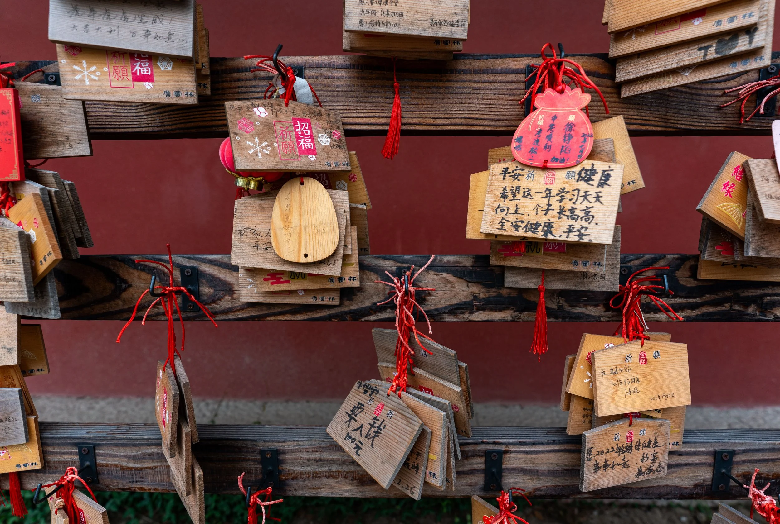Shanghai – Wishes carved in ink, suspended offerings whispering devotion across generations and unseen gods.