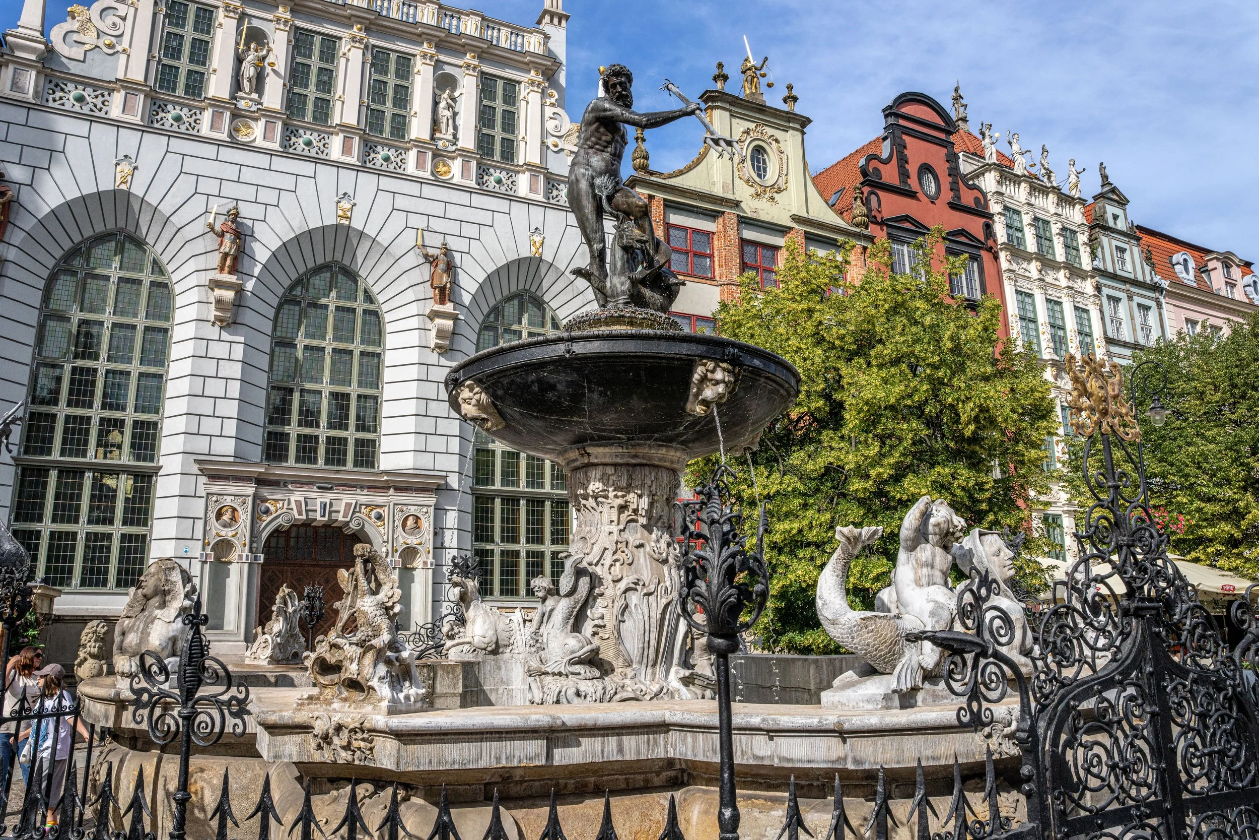 Gdańsk, Neptune Fountain - God of the sea reigns in stone, symbolizing maritime pride and Hanseatic heritage.