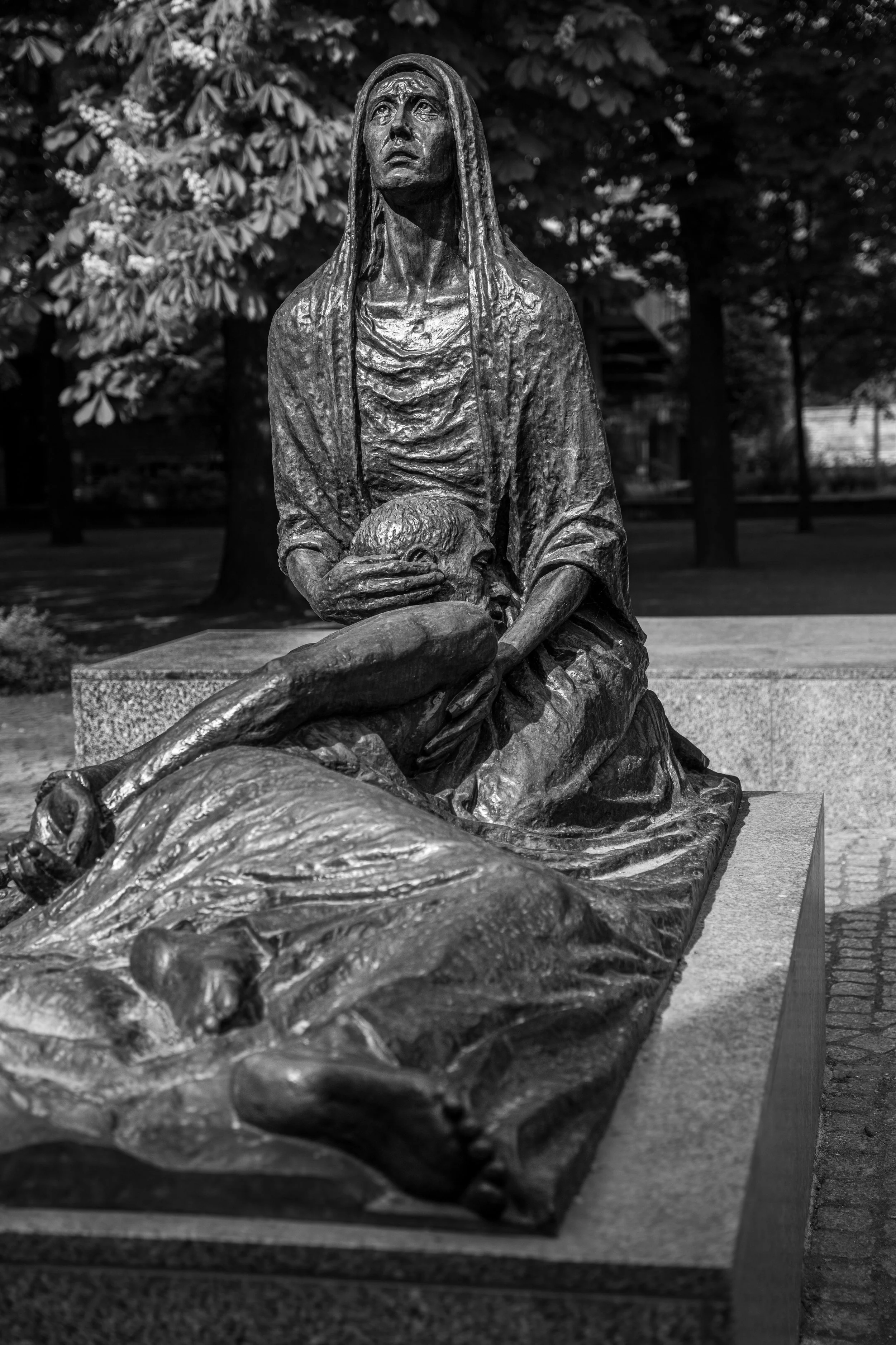 Wrocław, Katyń Monument - Bronze mother mourns fallen son, embodying Poland’s grief, remembrance, and unyielding historical truth.