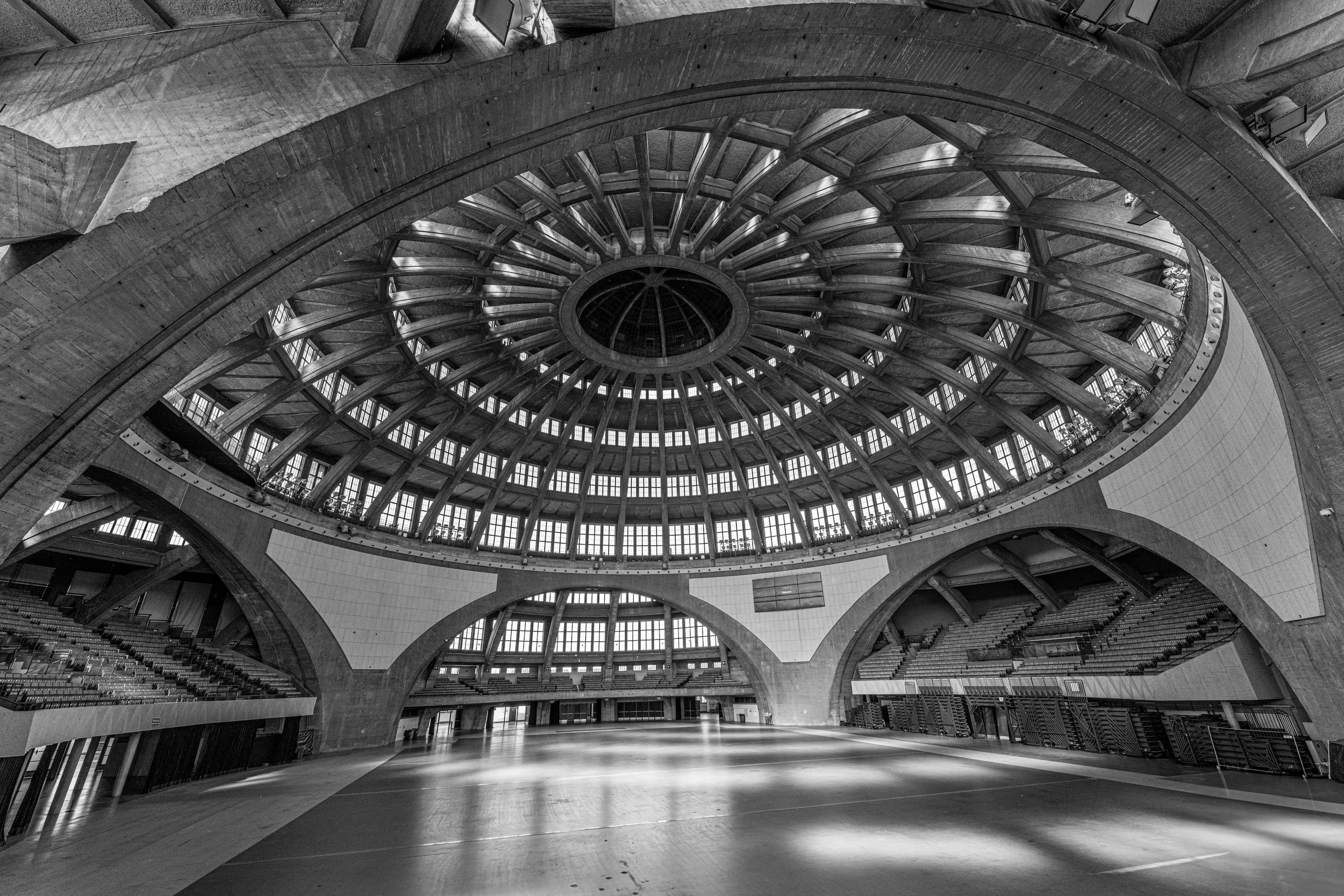 Wrocław - Centennial Hall, - Beneath the vast dome, echoes dissolve into stillness. Space itself holds its breath in quiet majesty.