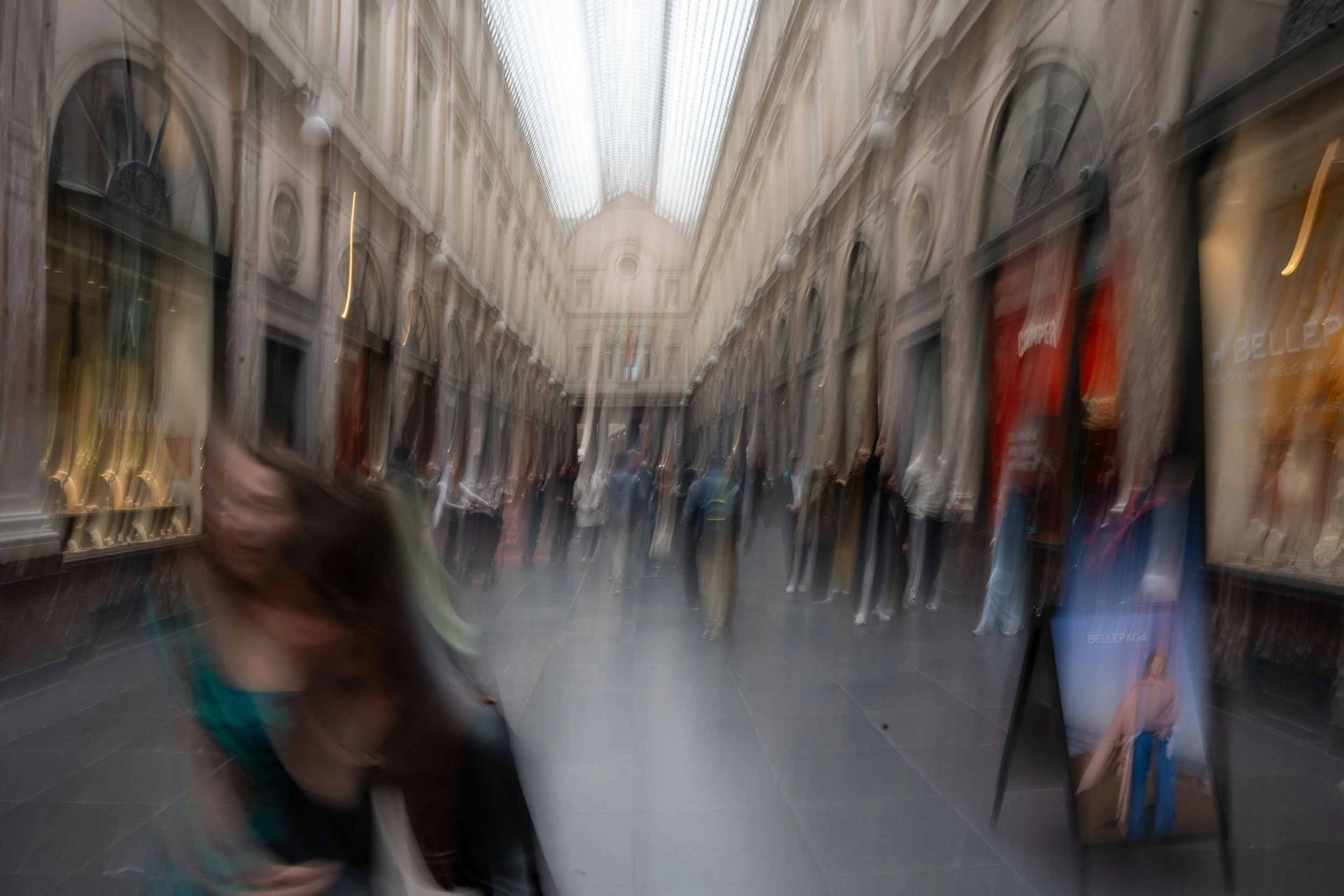 Bruxelles - Shadows drift like whispers, blending with light—an endless dance between memory and fleeting presence.