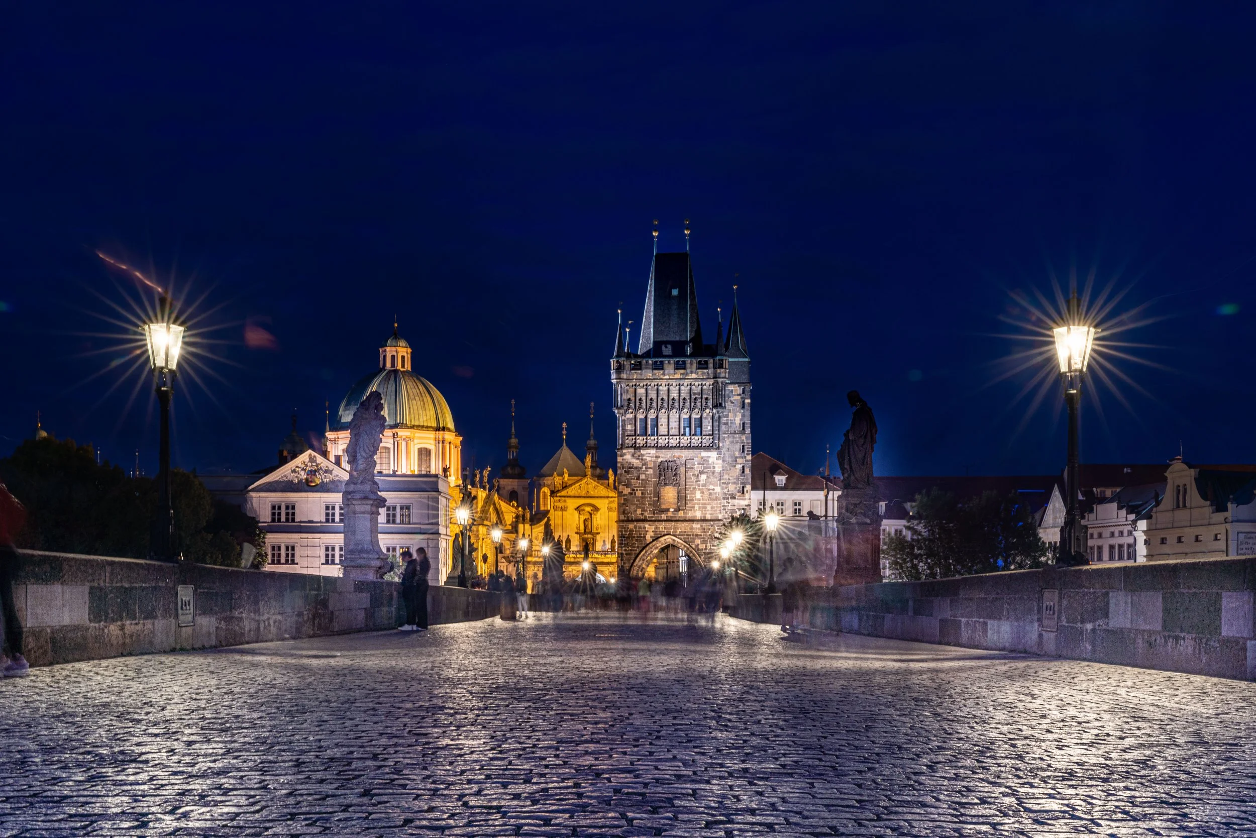 Prague, Charles Bridge - Night unveils a gothic stage, where history, myth, and whispers of empires linger eternally.