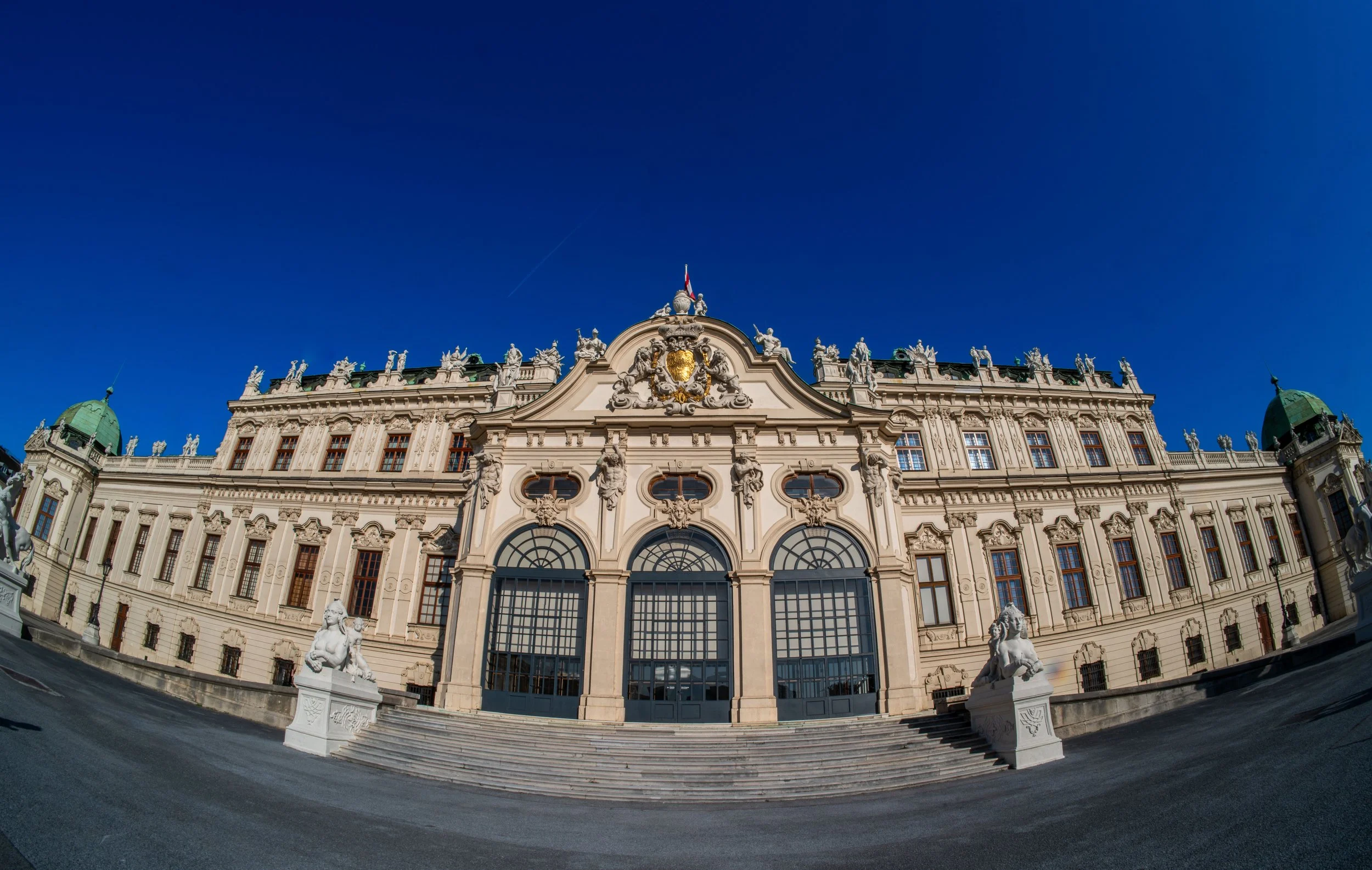Vienna, Belvedere Palace - Marble lions and soaring domes, a palace where Habsburg dreams became Europe’s radiant cultural memory.