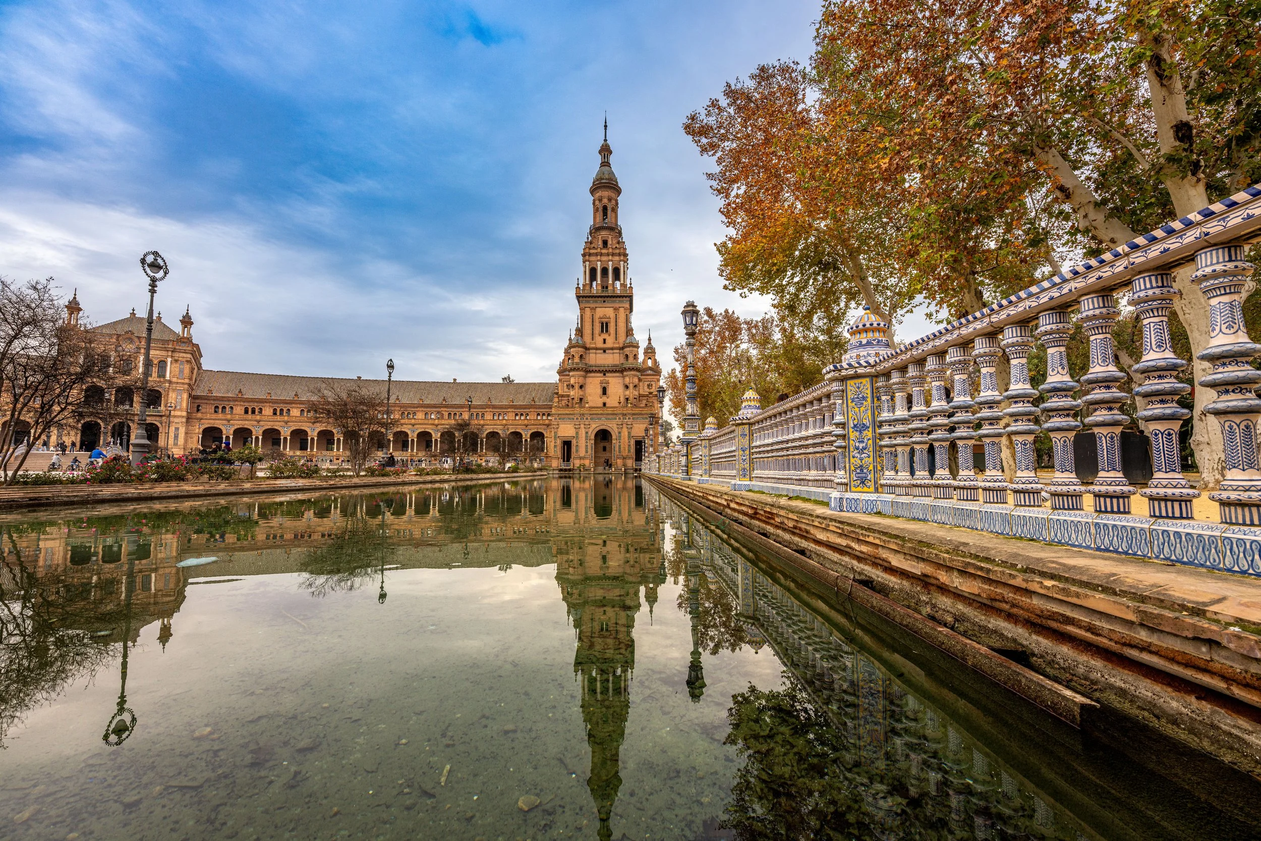 Seville, Plaza de España - Arches and tiles embrace history, reflecting Spain’s grandeur, Moorish echoes, and Andalusian pride.