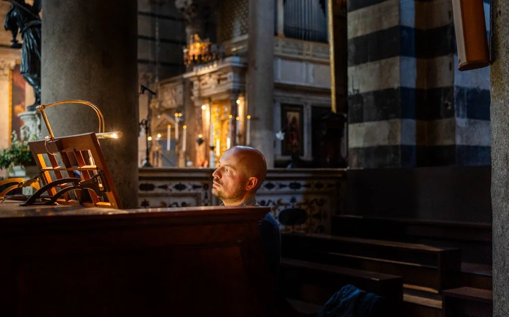 SIENA, ITALY A quiet moment in sacred light.
