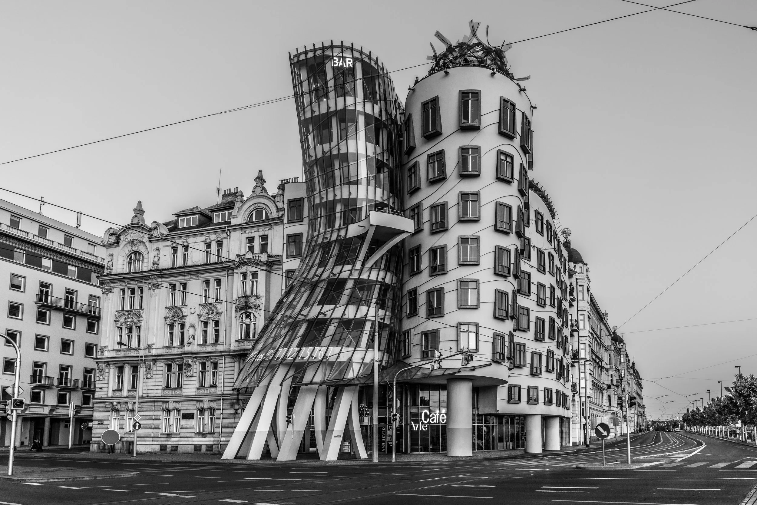 Prague, Dancing House - Curves defy order, glass bends toward silence, where architecture whispers against the city’s noise.