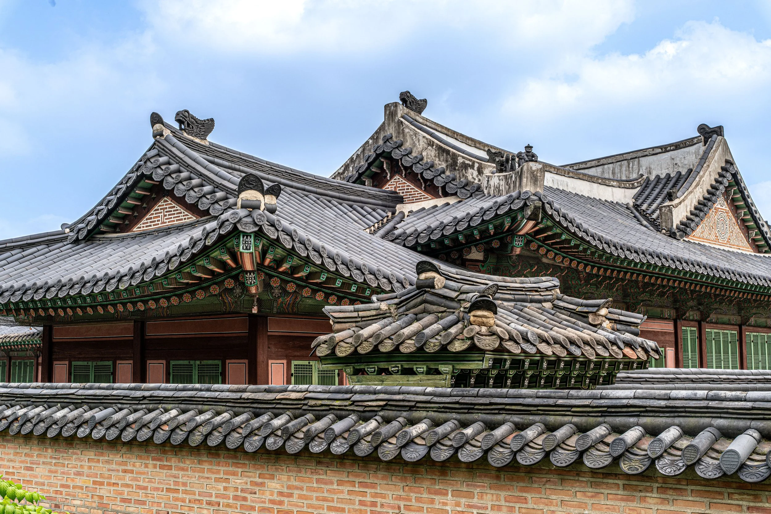 Seoul, Changdeokgung Palace - Curved tiled roofs and painted beams embody Joseon harmony, resilience, and timeless royal heritage.