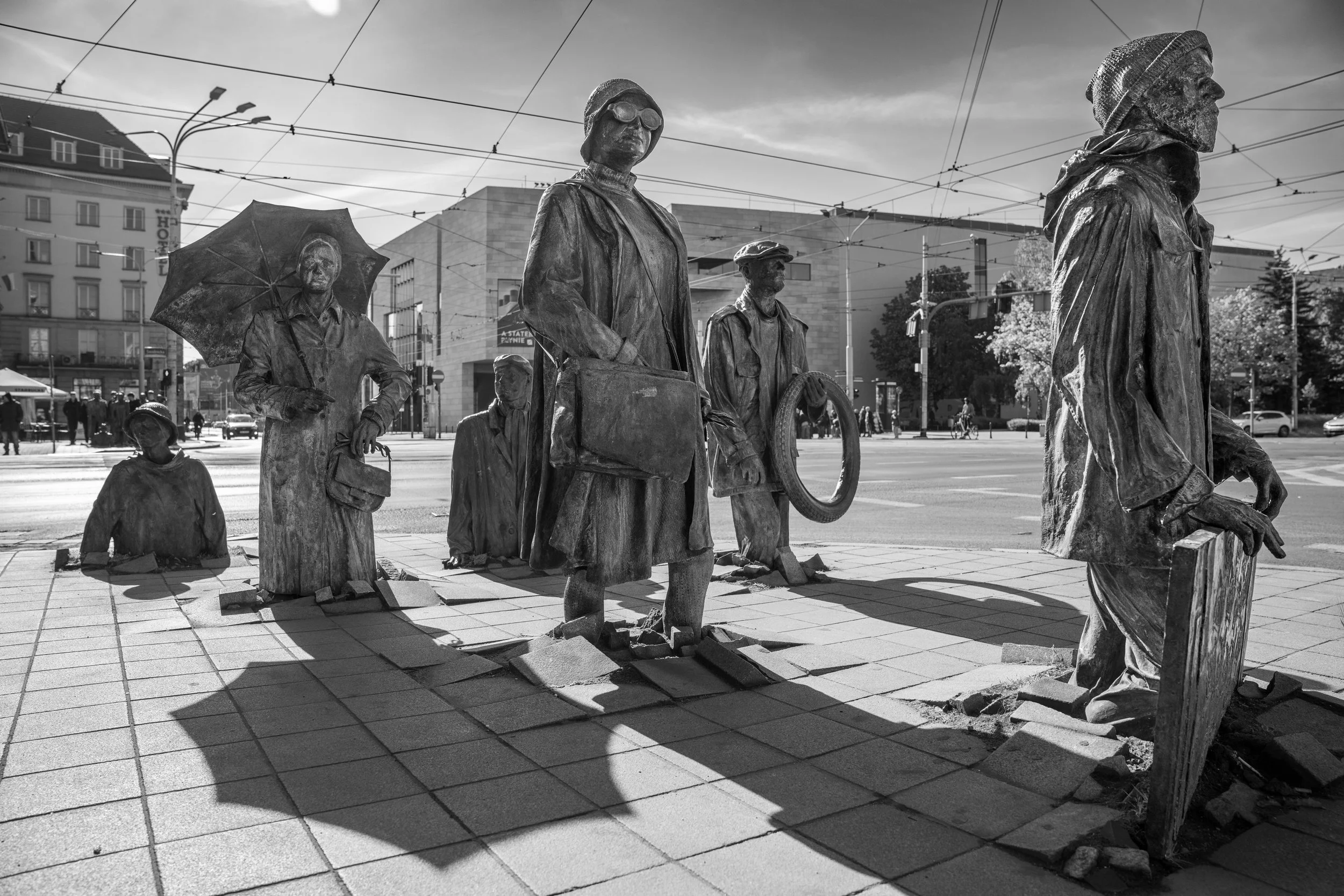 Wrocław, Monument of the Anonymous Passers-by - Emerging and vanishing, statues testify to oppression endured, resilience preserved, and memory never surrendered.