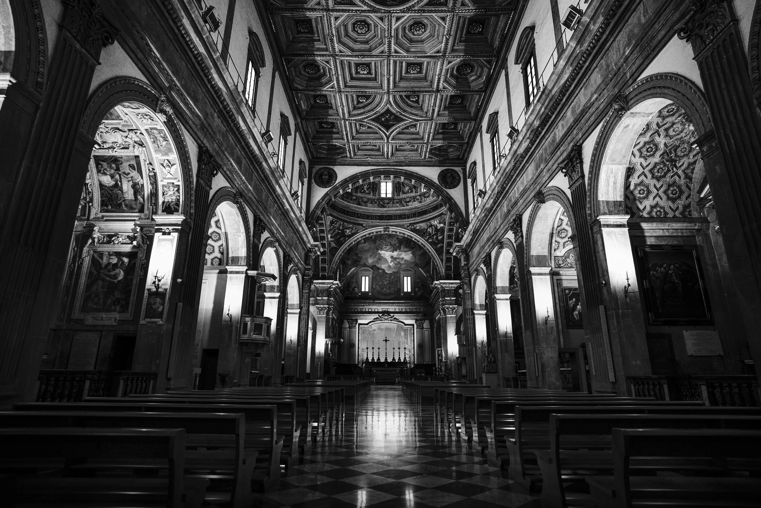 Città di Castello: Light and silence rise together through arches, where faith lingers in every shadow.