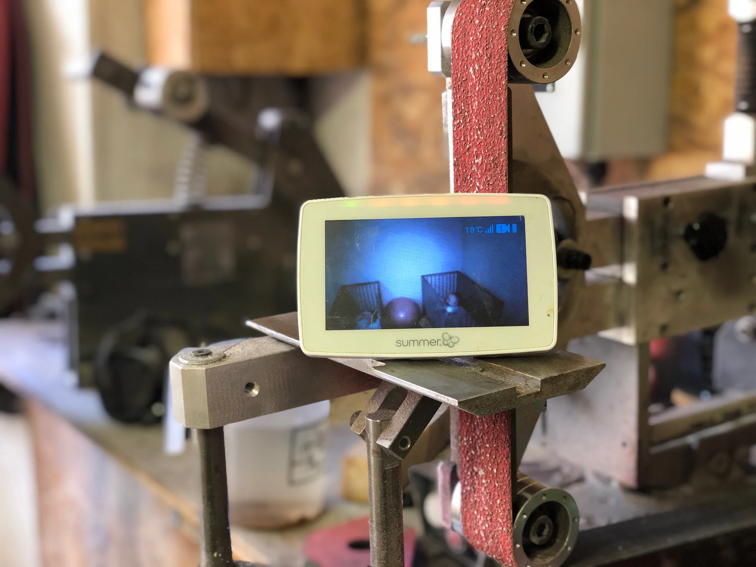 A baby monitor, just as important as the other machines in the workshop