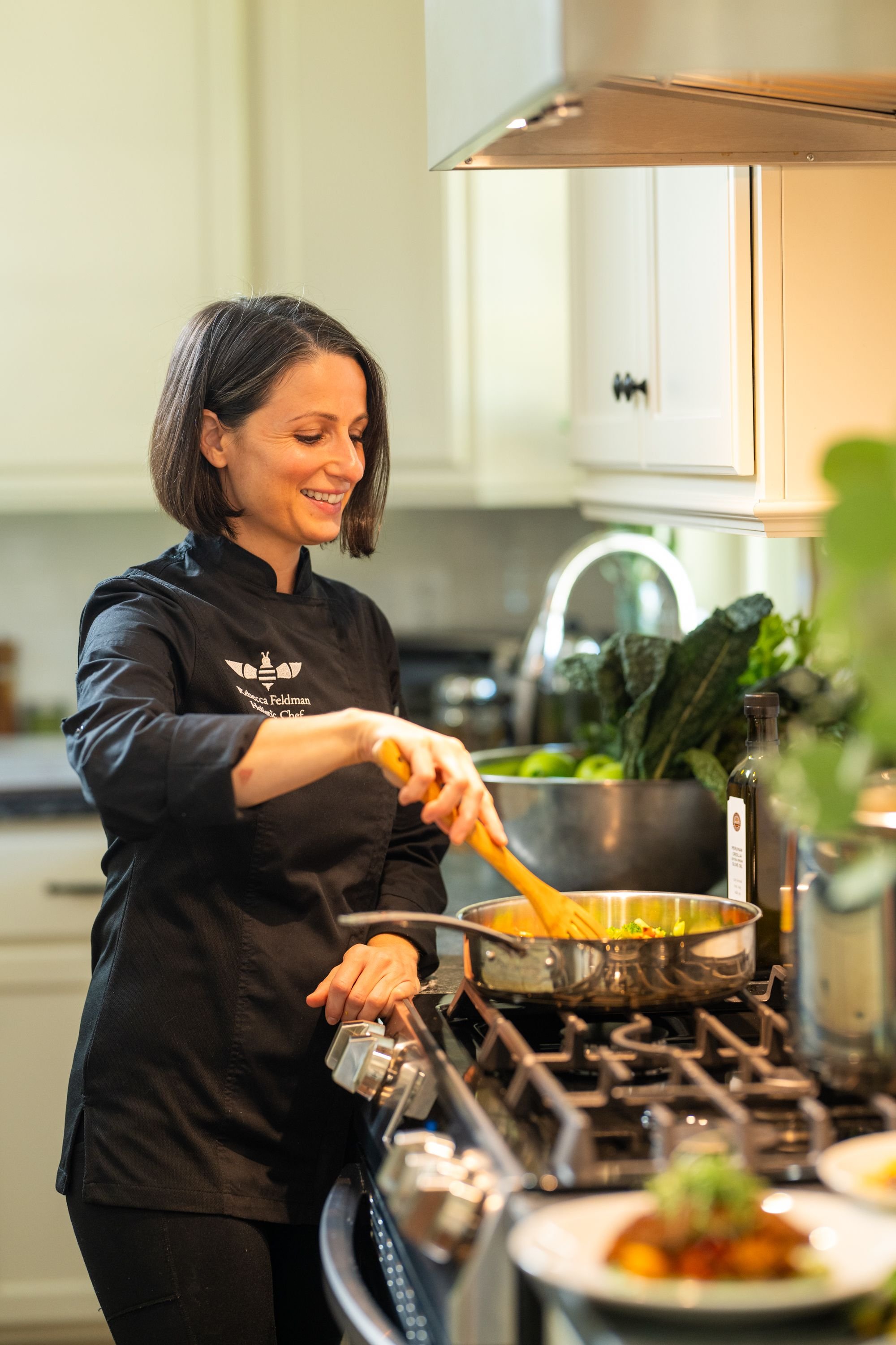 Chef Rebecca at stove.jpeg