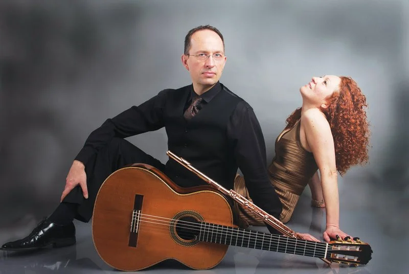 Denis with guitar & Eugenia with flute
