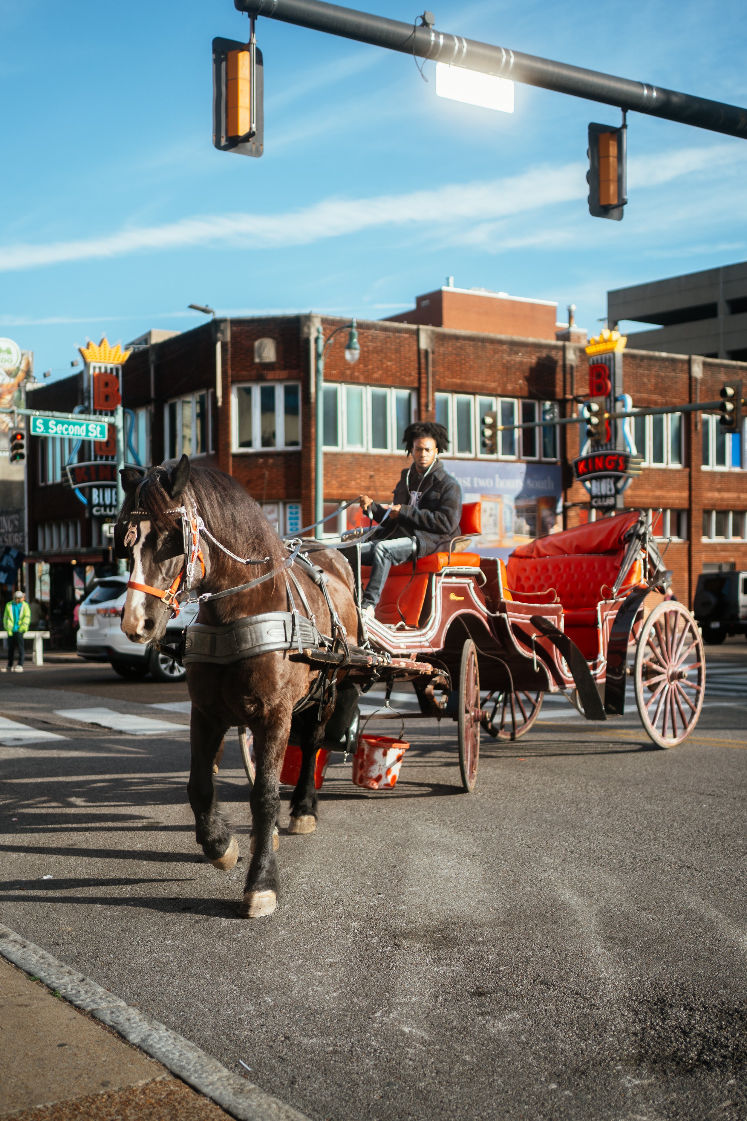 Beale street and it's vibrant horse drawn carriages
