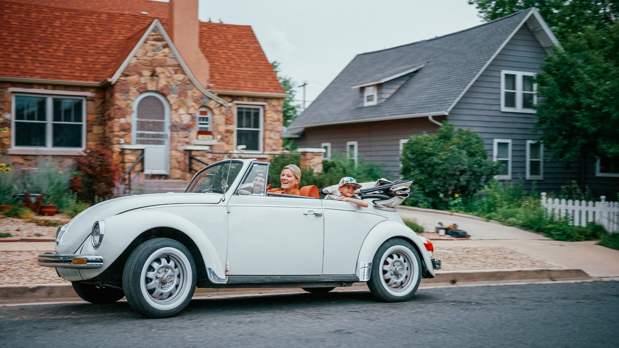 Convertible on a neighborhood street in WishGarden’s Back to School film