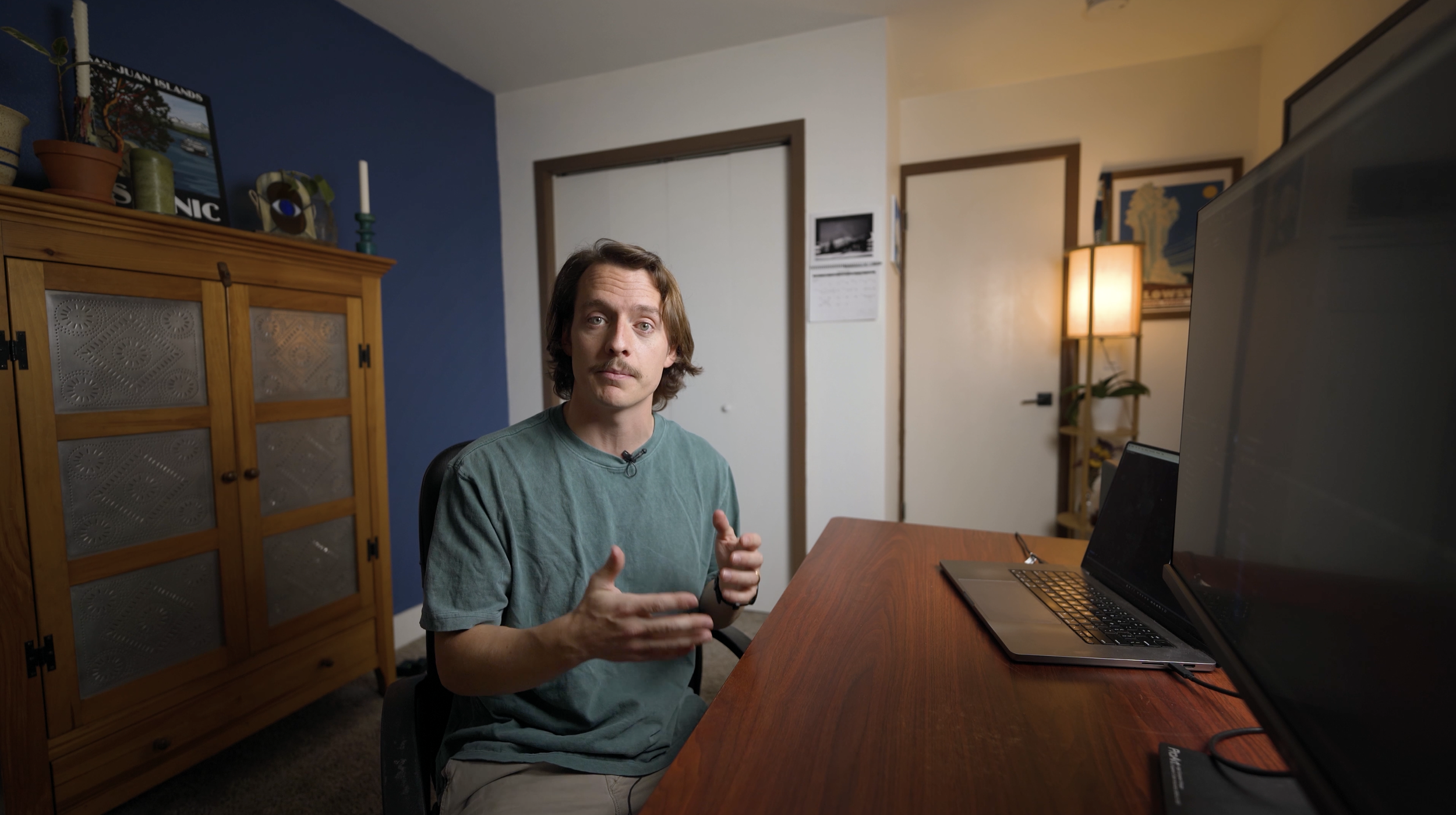 Roo Smith at computer editing